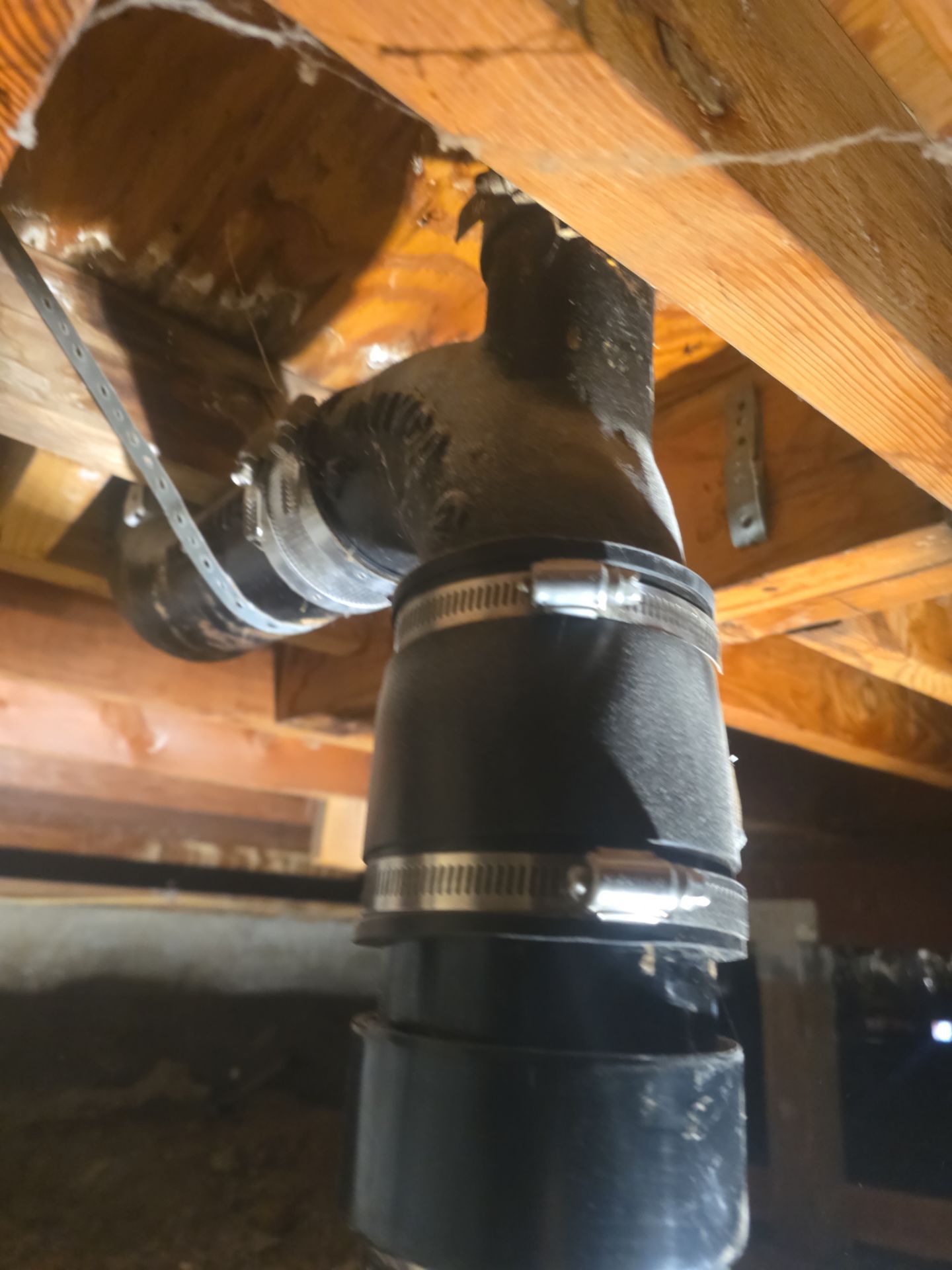 Installation of New Tall Black Piping (Wall to Ceiling) & Underground Piping by Us Plumbing