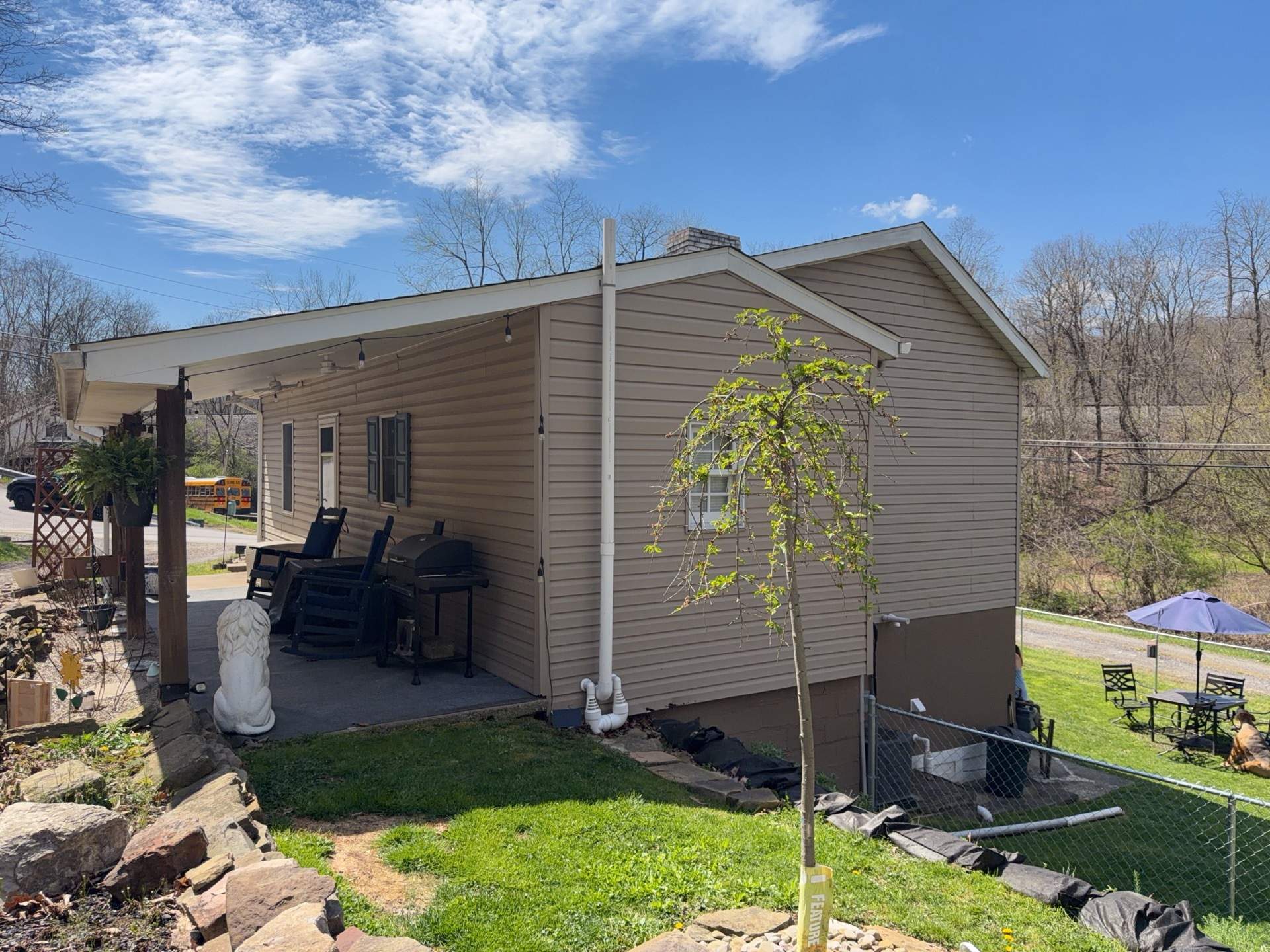 Jefferson Hills Vertical Board and Batten Siding and TandoStone Renovation by Ideal Siding Pittsburgh