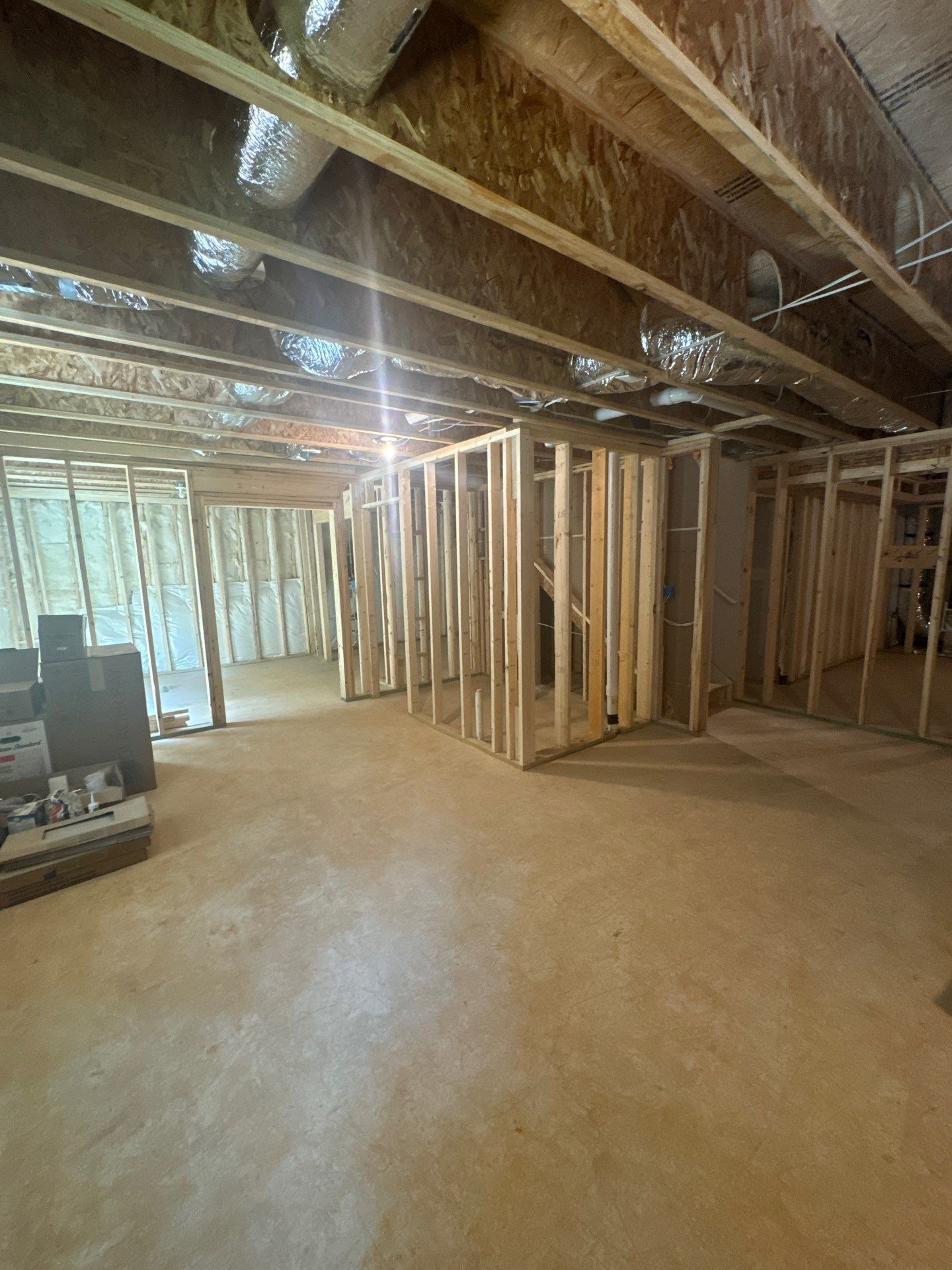 Finished Basement in Acworth Featuring a Full Bathroom and Bar by Swift Home Renovations