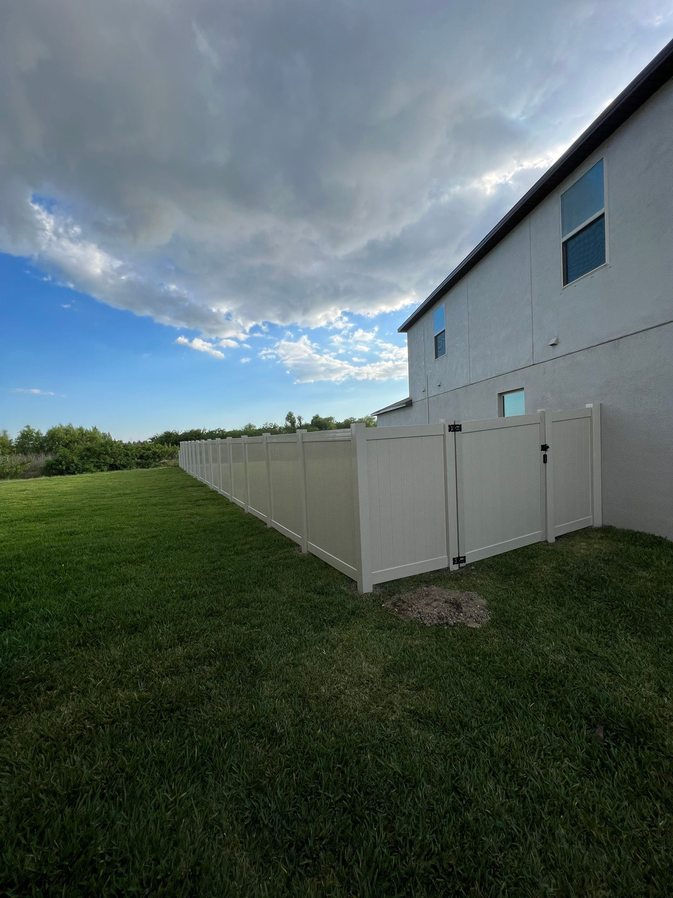 Apollo Beach, FL 6ft. Tall Tan Vinyl Privacy Fence by Asap fence and gates, LLC