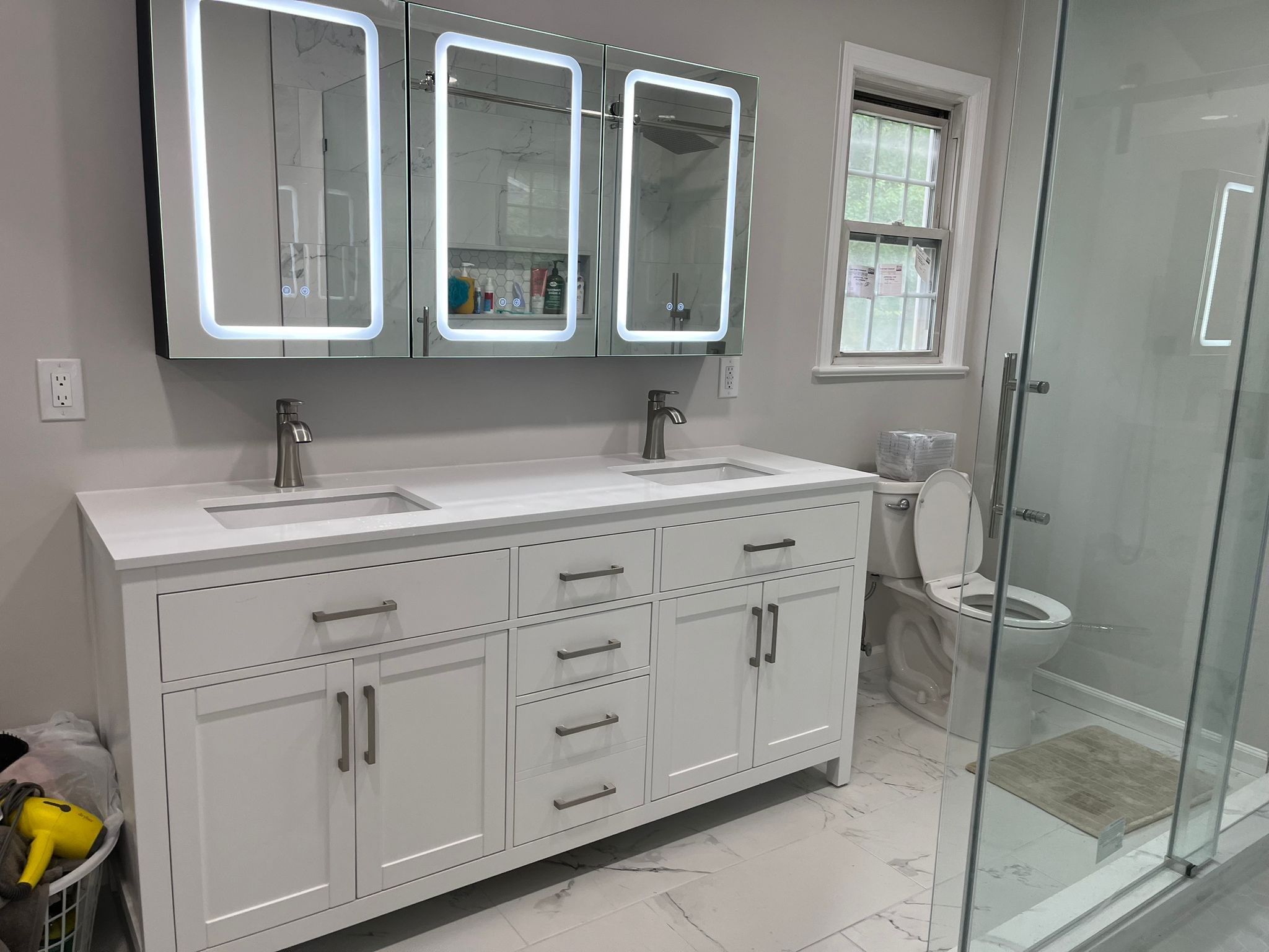 Bathroom Remodel using Tile by Home Concepts Construction