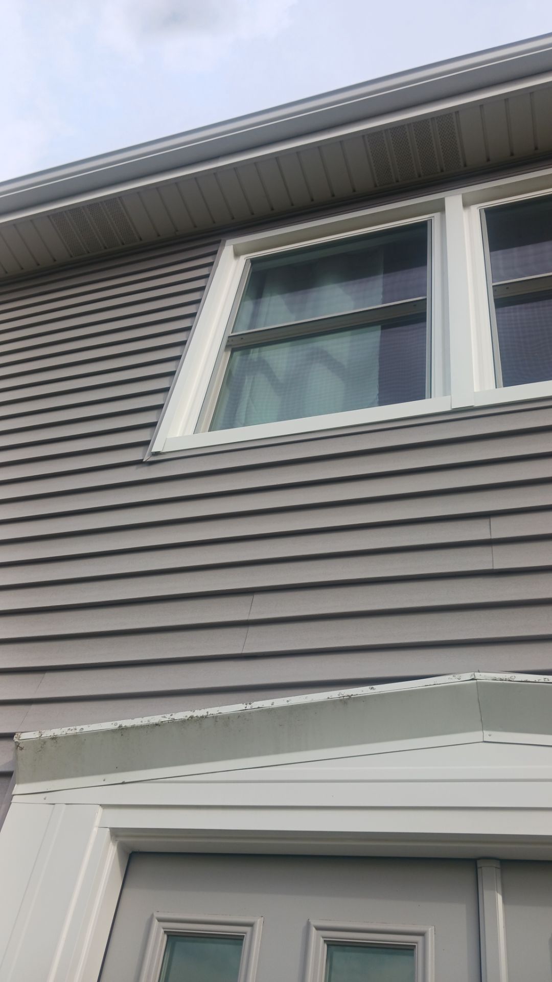 New Siding and Windows by NextWave Construction