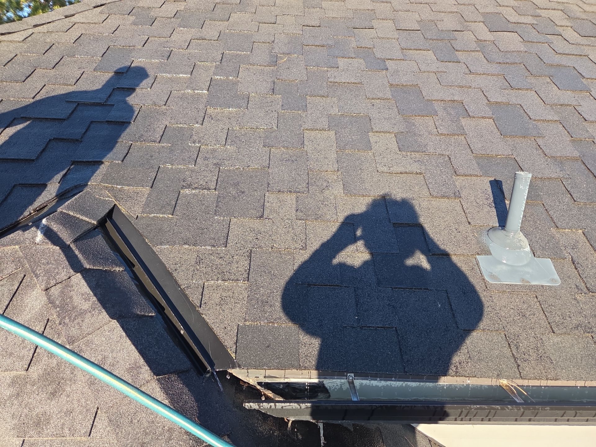 Gutter and Downspout Cleaning by RTP Roofing Company