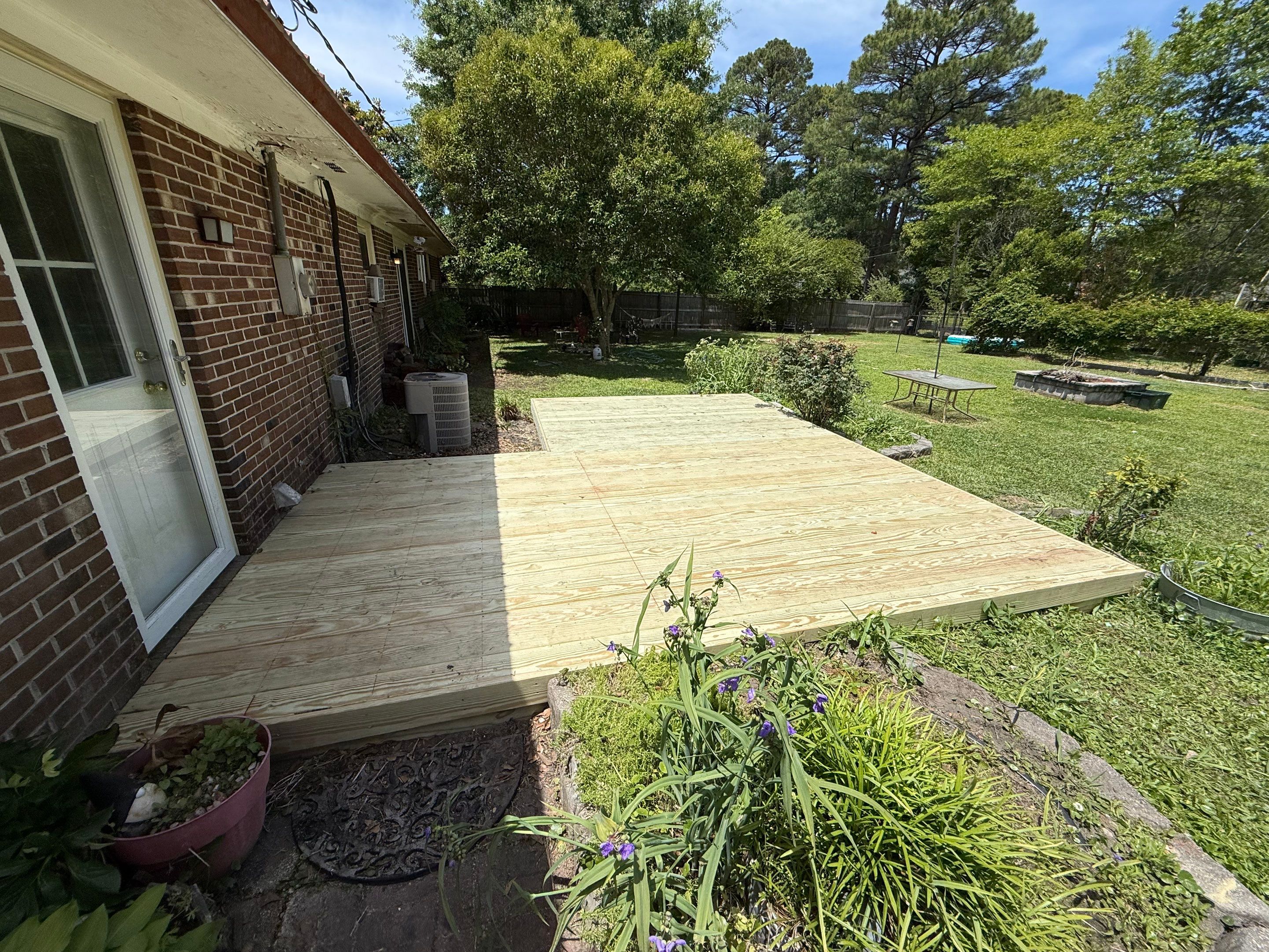 Custom Pressure-Treated Wood Deck Installation in New Bern by The Remodeling Company
