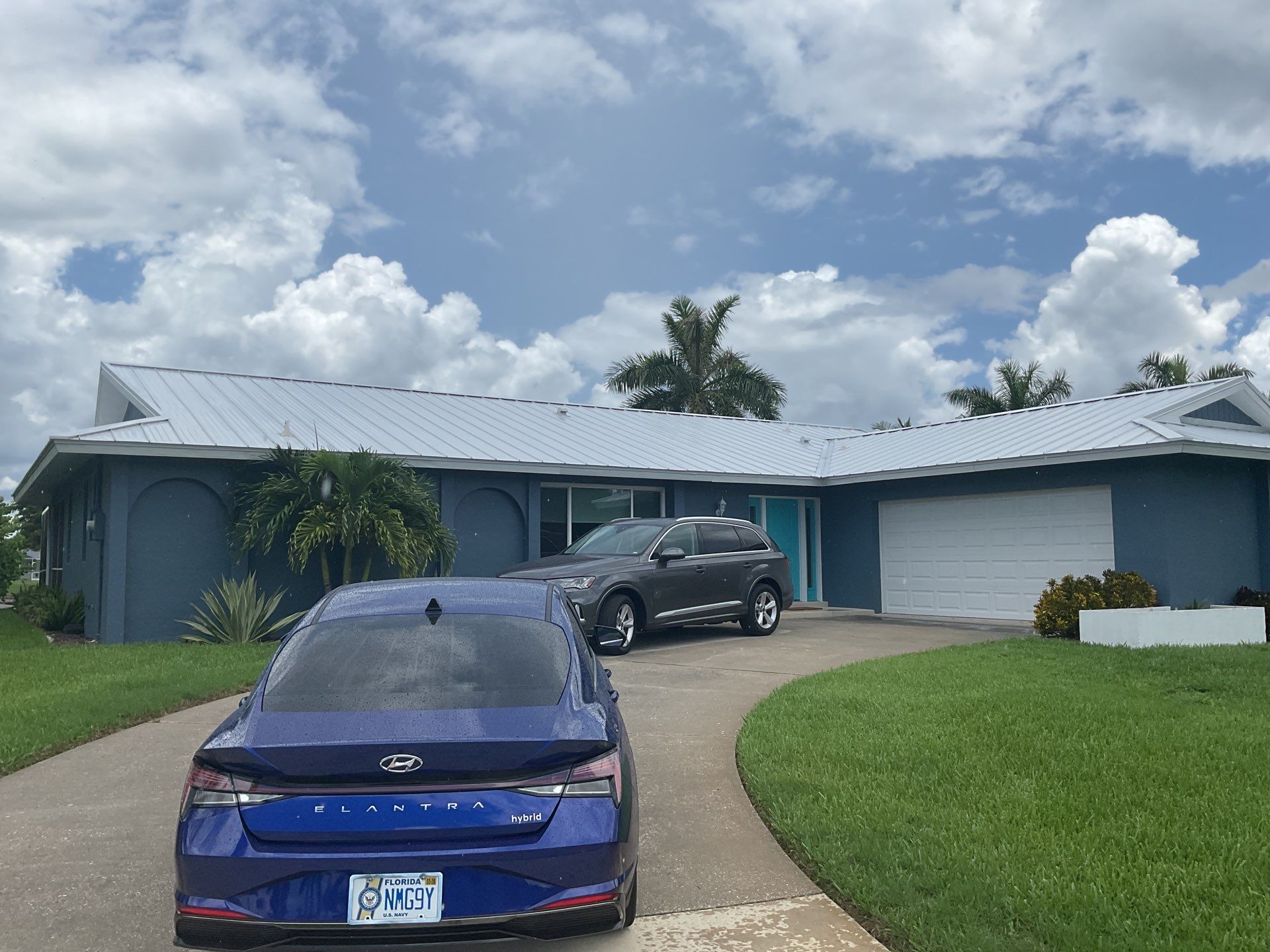 White Downspouts and Gutters Combo in Punta Gorda FL by Gutter Professors