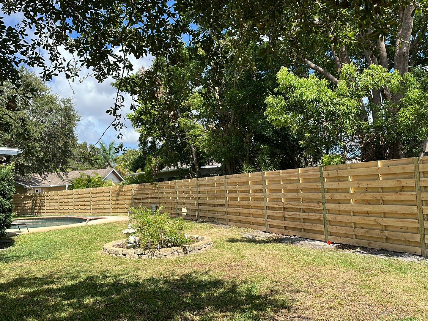 Wood Fence Installation using Horizontal Shadowbox Wood Privacy Fence by Asap fence and gates, LLC