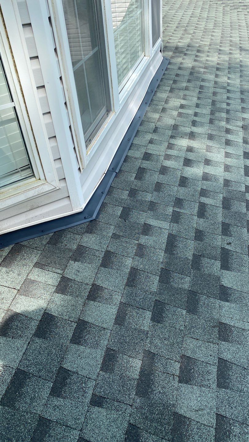Residential Roofing Installation using Roof Replacement by American Roofing & Construction LLC