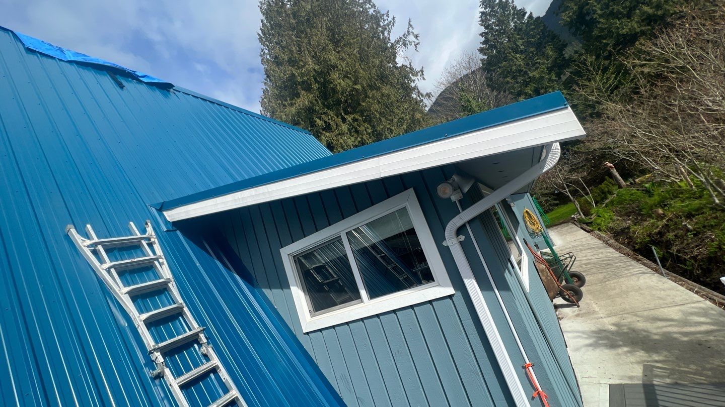 Residential ReRoofing Installation using Duraclad 26ga by Top Notch Roofing Inc