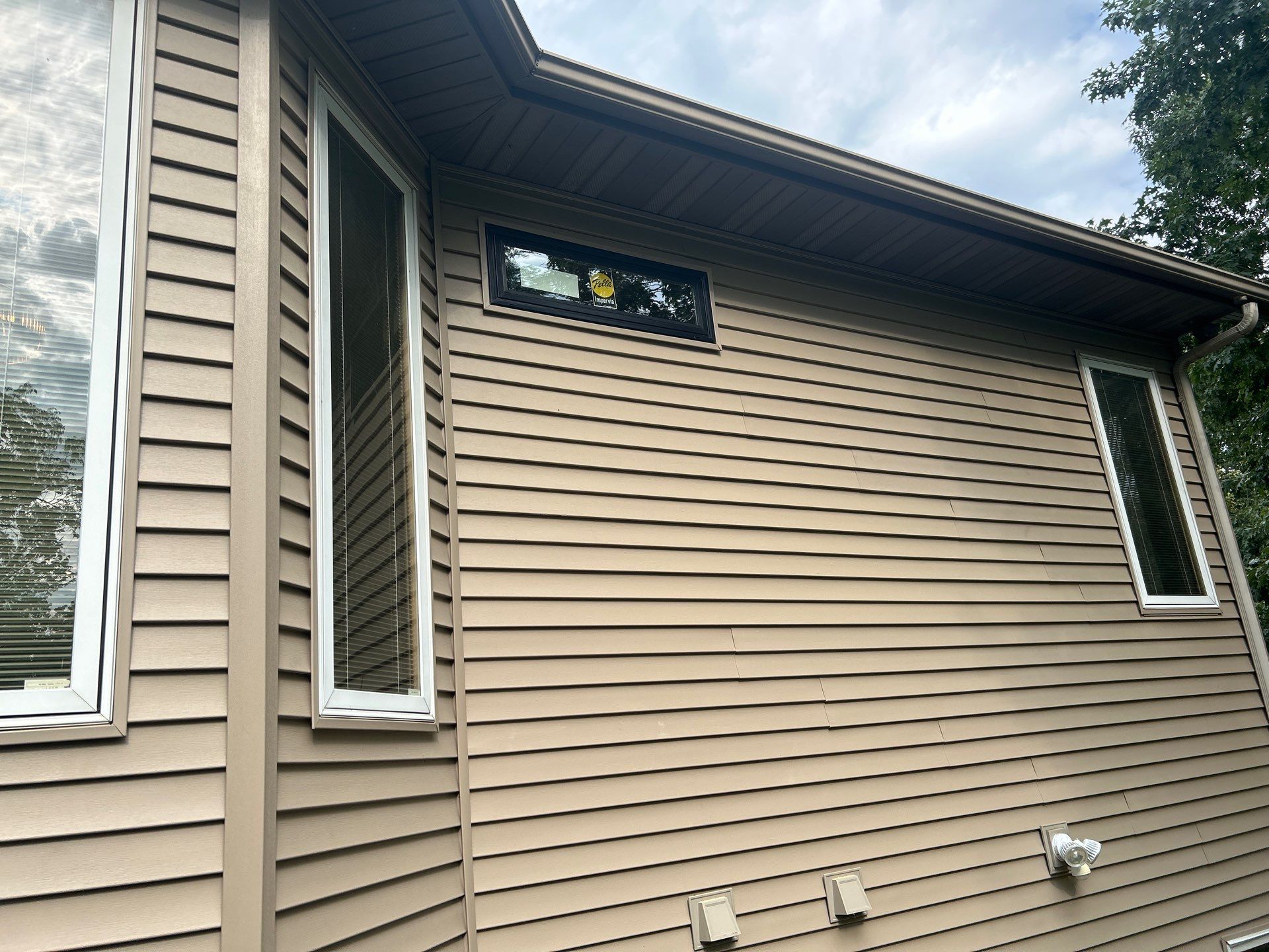 Stylish Upgrade with Pella Lifestyle Series Windows, Patio Door & Entry Doors by United Windows and Siding LLC