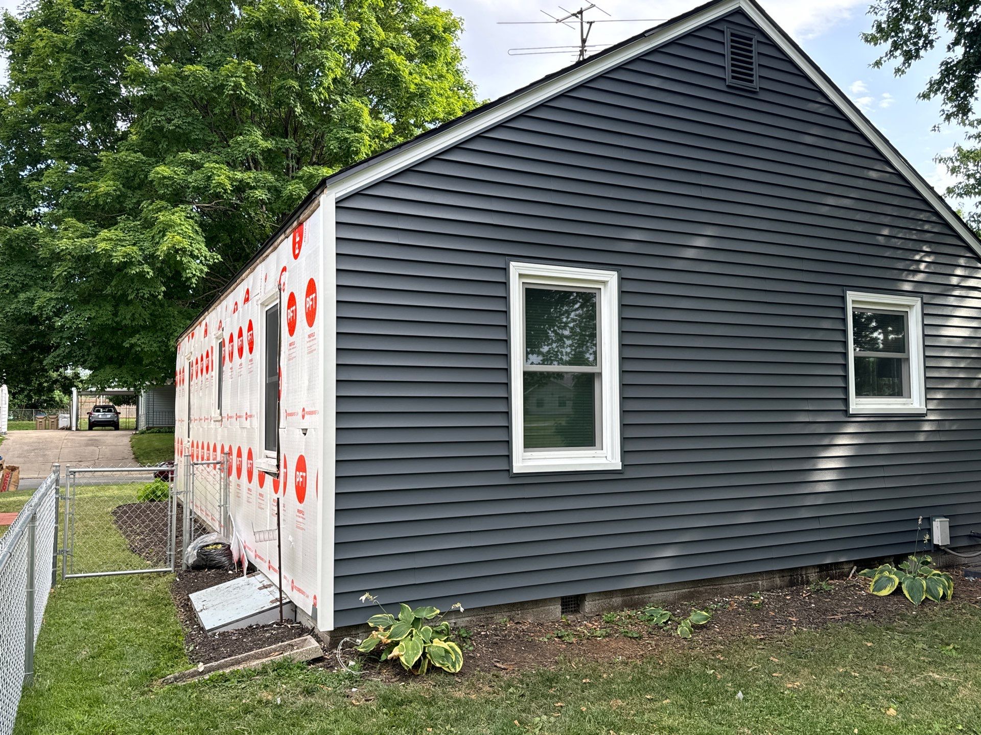 NKC Happy Blues by EEC Windows, Siding & Roofing