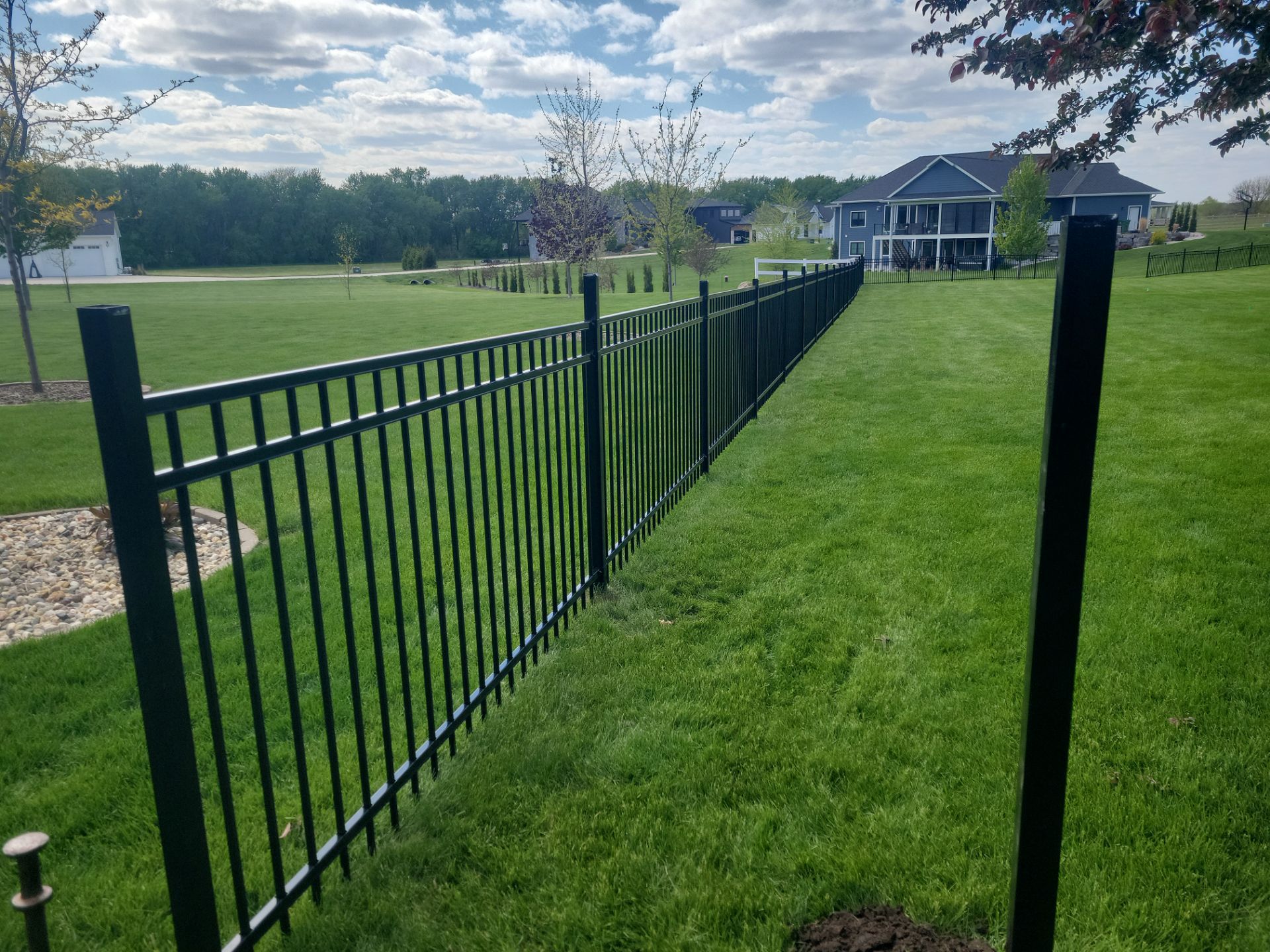 Black Ornamental Metal Picket Fence Installation in Waterloo by Perfect Picket Fence and Stain
