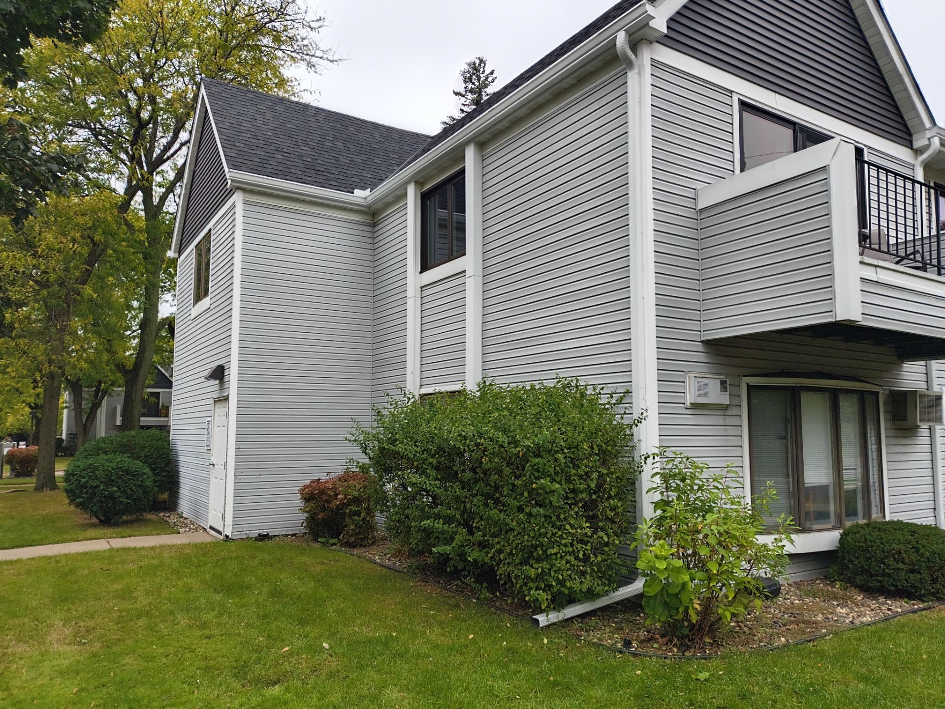 Condominium Gutter Installation in Minneapolis, MN by Next Level Seamless Gutters / Exteriors Inc.