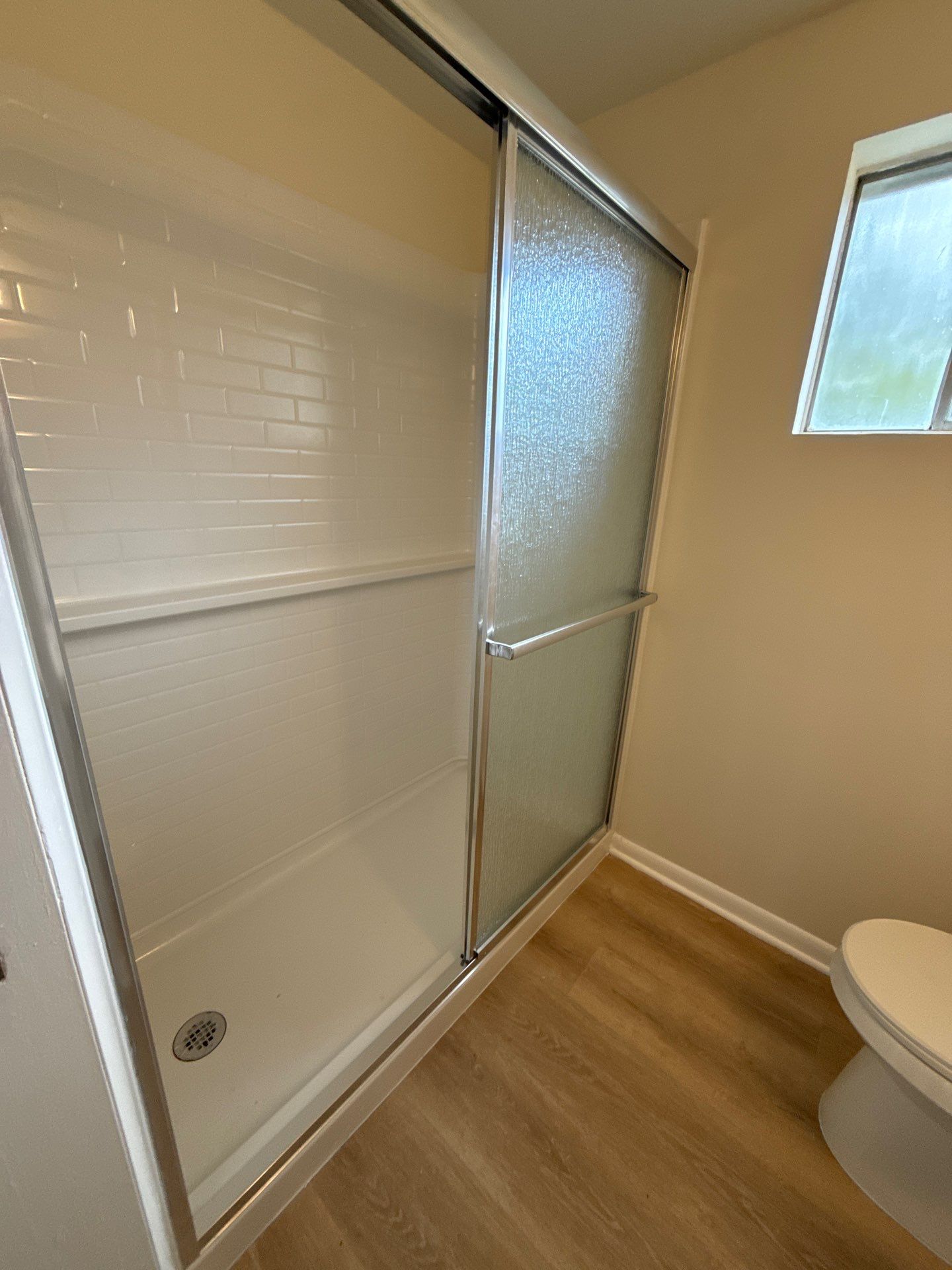 Half bathroom conversion to full bathroom  by Jesus Master Handyman LLC 