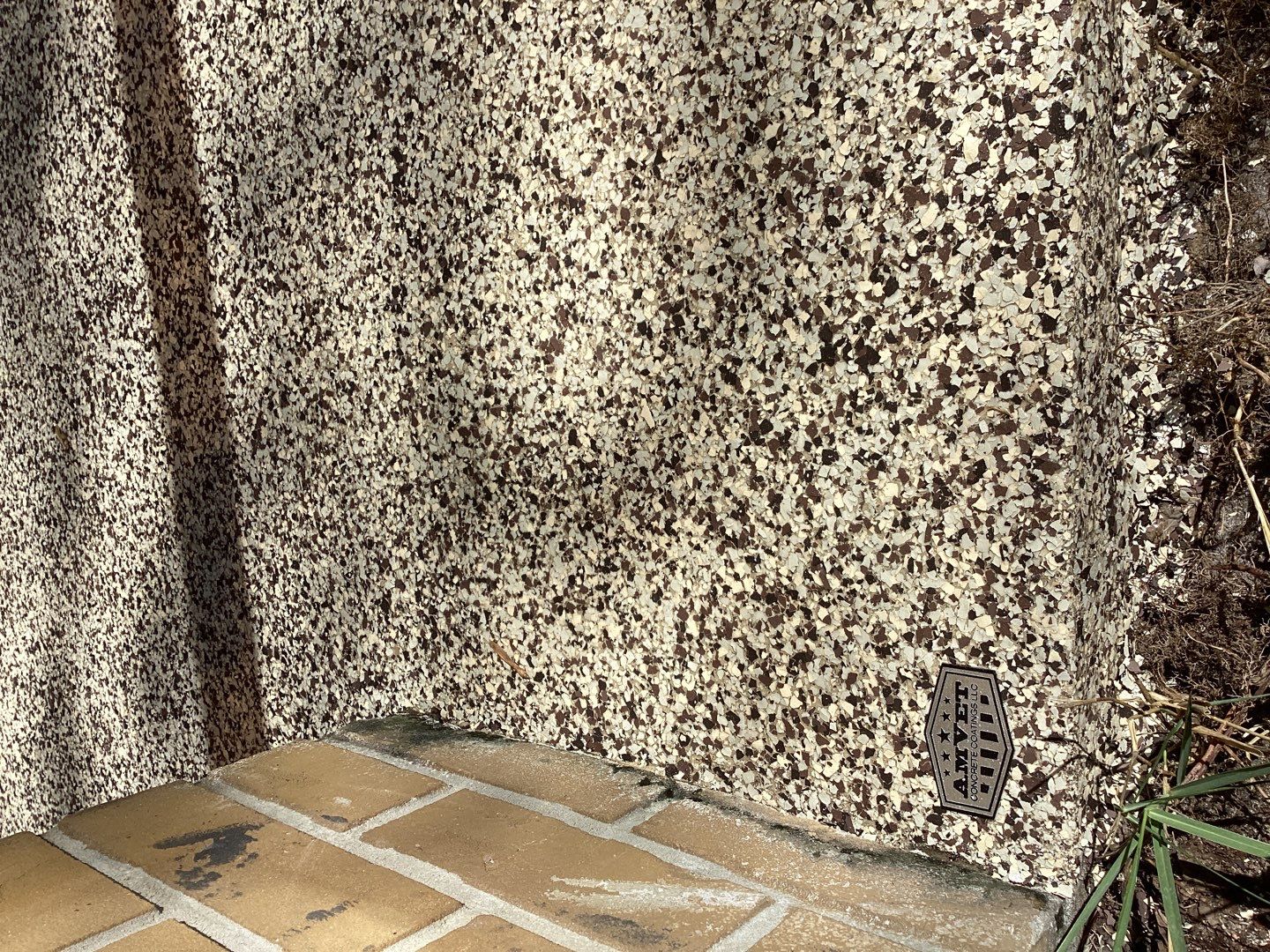 Patio using Cordwood by Amvet concrete coatings llc