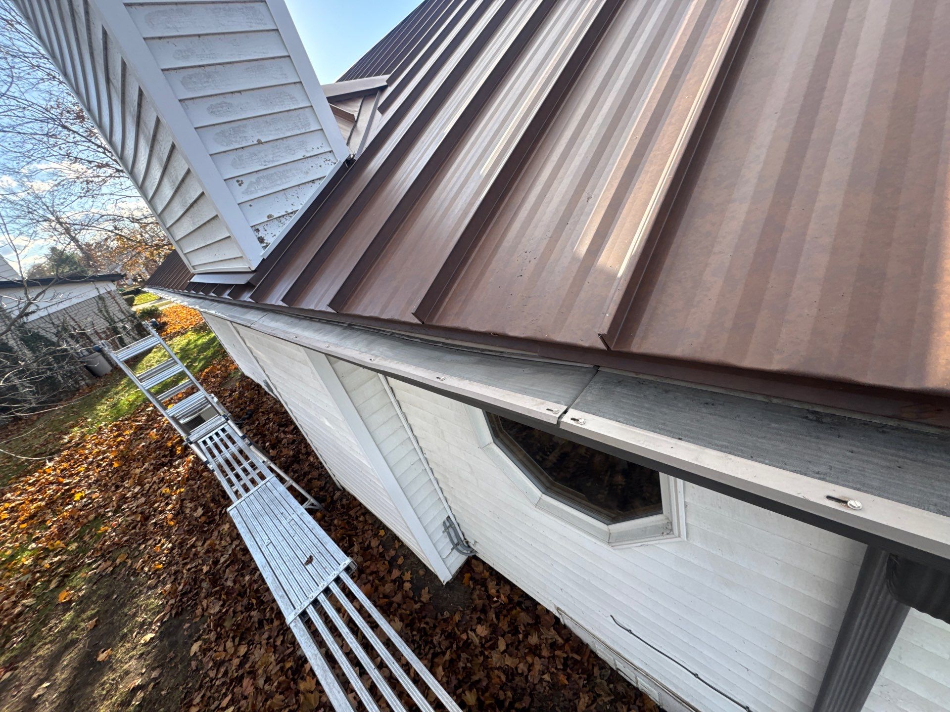 Roof Replacement using MS Standing Seam Roof Western Rust by 180 Contractors