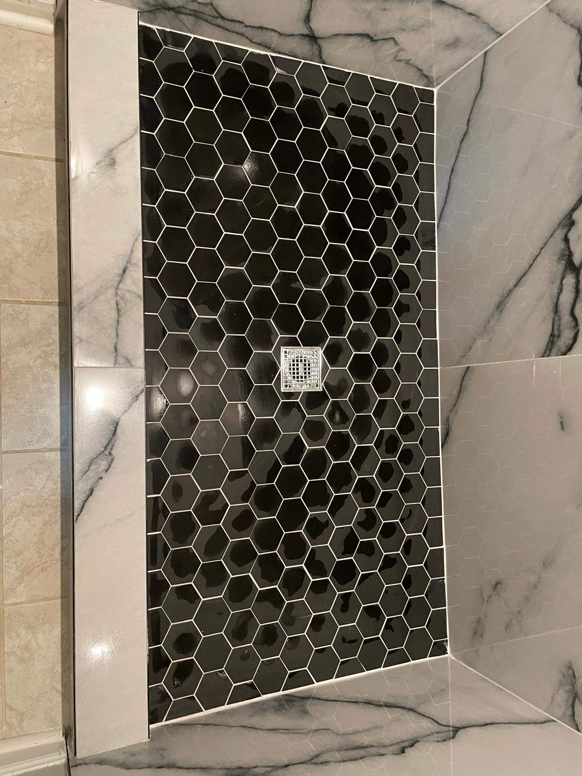 Tub to walk-in shower conversion by Prudencio