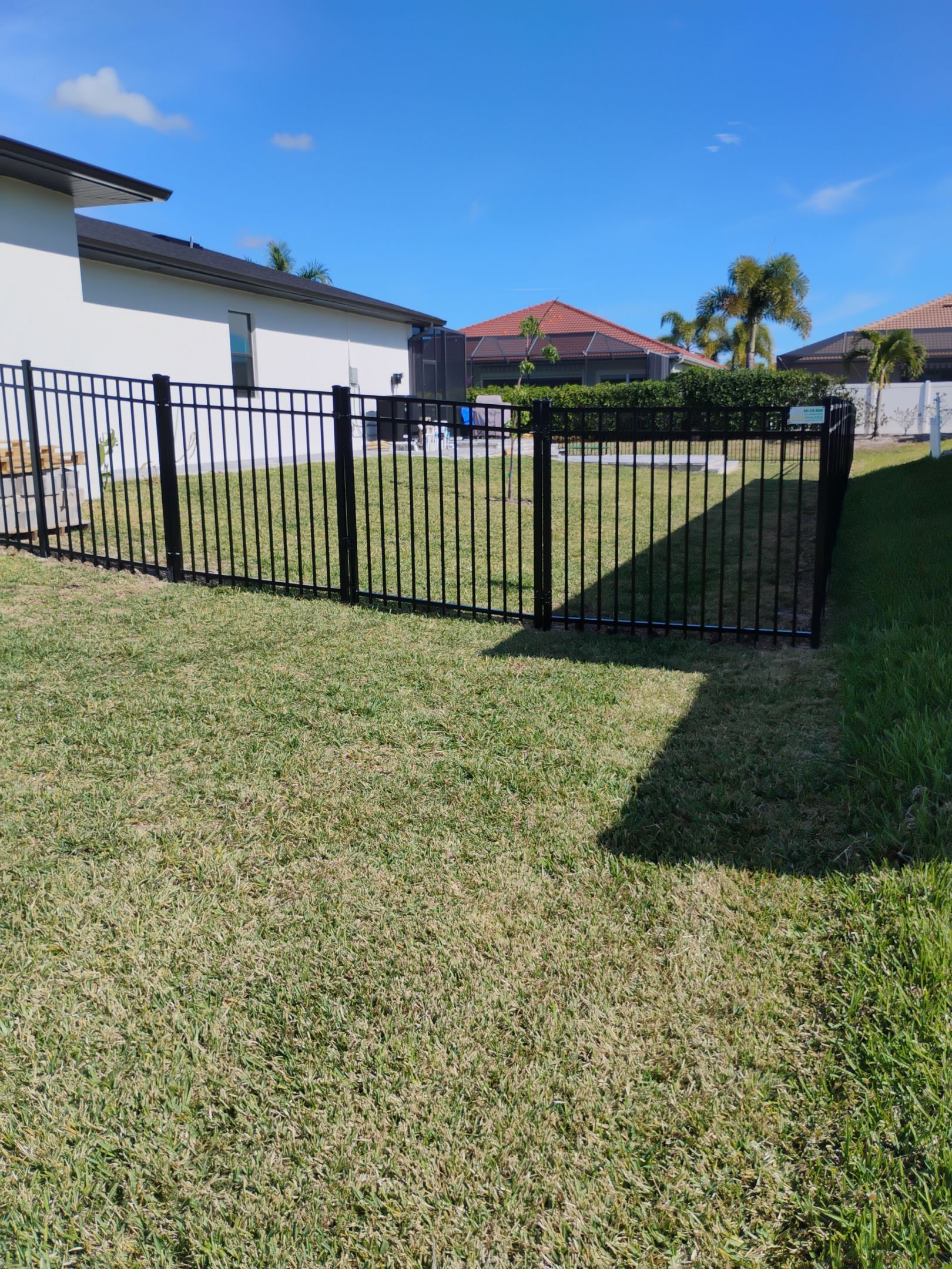 Bronze Aluminum Fence in Cape Coral by True Fence LLC