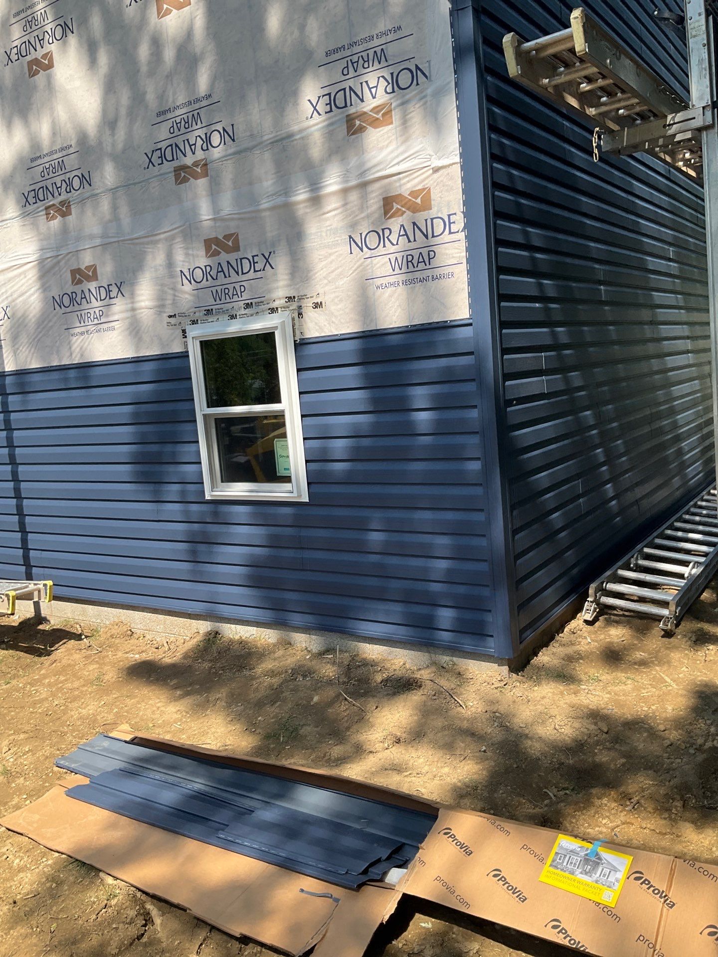 Two-Story Residential Addition and New Garage in Hummelstown by Esh Builders