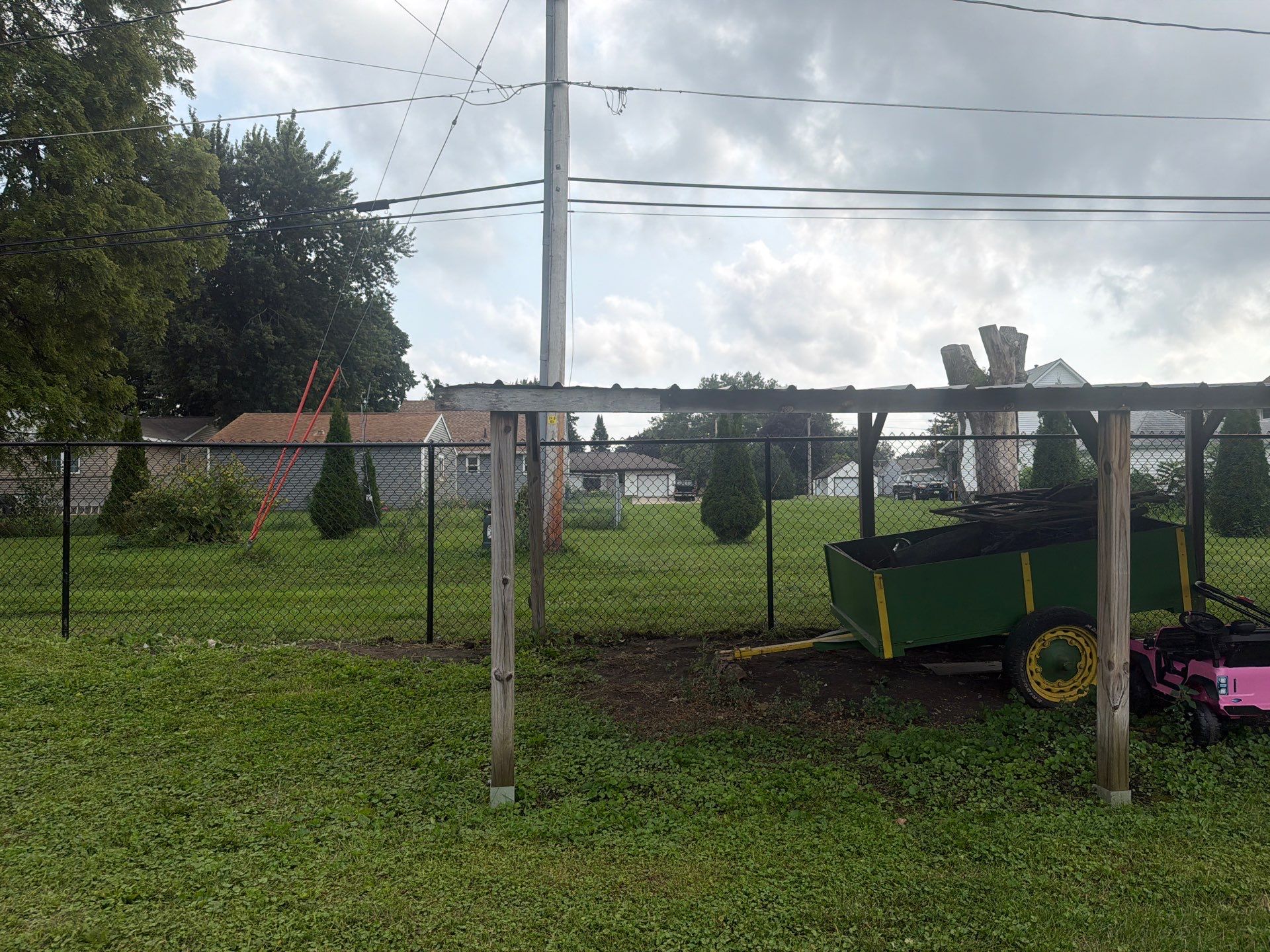 Residential Black Chain Link Fence Installation in Reinbeck by Perfect Picket Fence and Stain