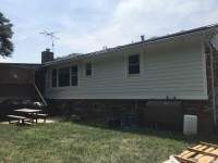 Siding Installation using James Hardy Cedar Mill Plank by ExteriorPros