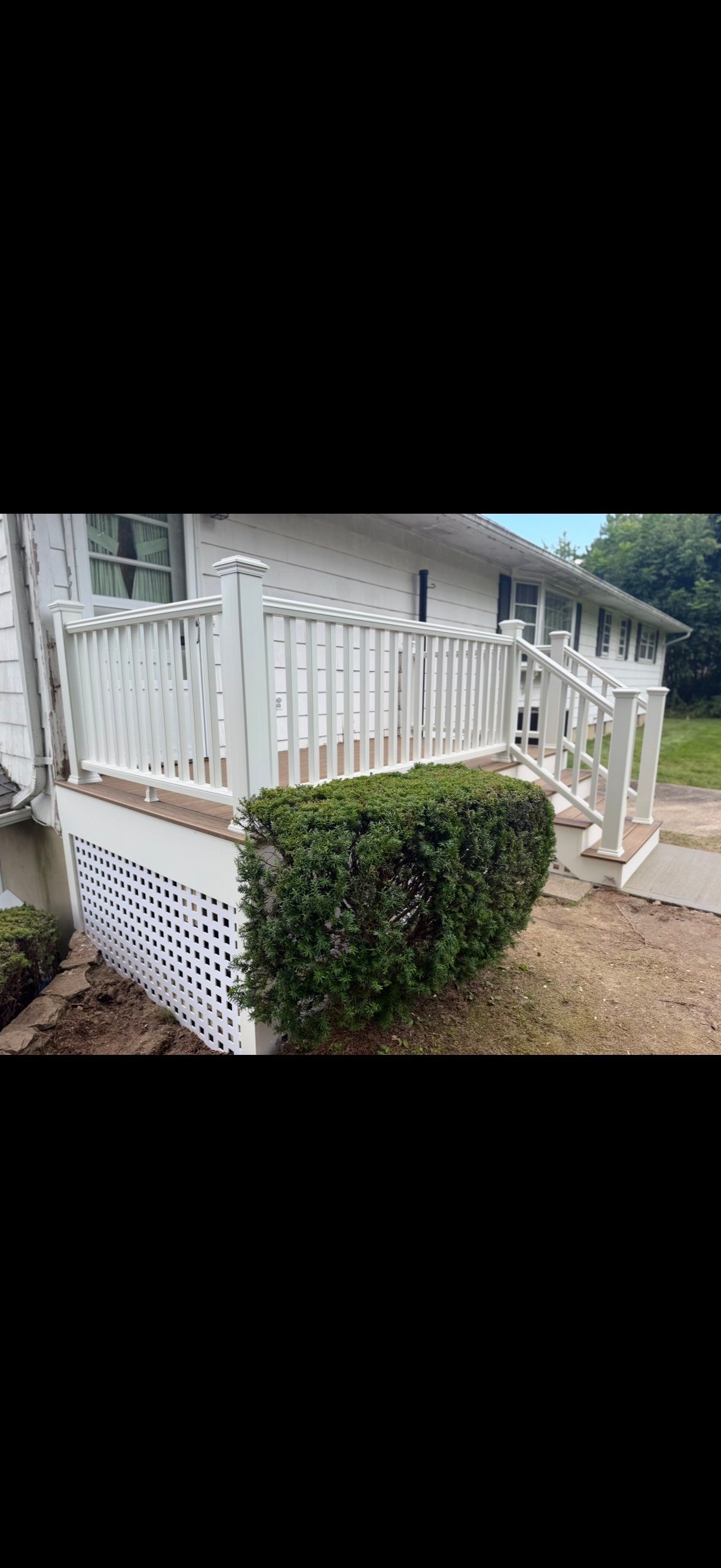 Deck Replacement using Trex Tropical Havana Gold and Transcend White Railings and white lattice by DiGiorgi Roofing and Siding Inc