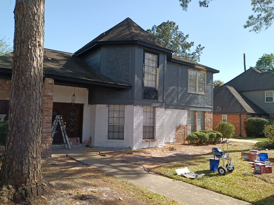 Interior and exterior painting project by Roof Concepts Construction
