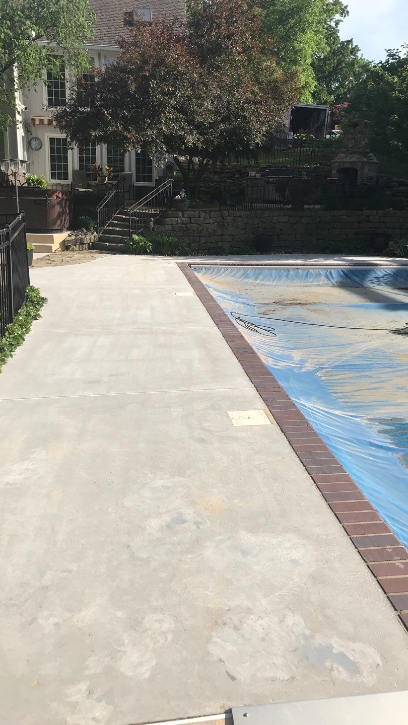 Pool Deck using Pebble Beach by Select Painting, Coatings & Garage Cabinets