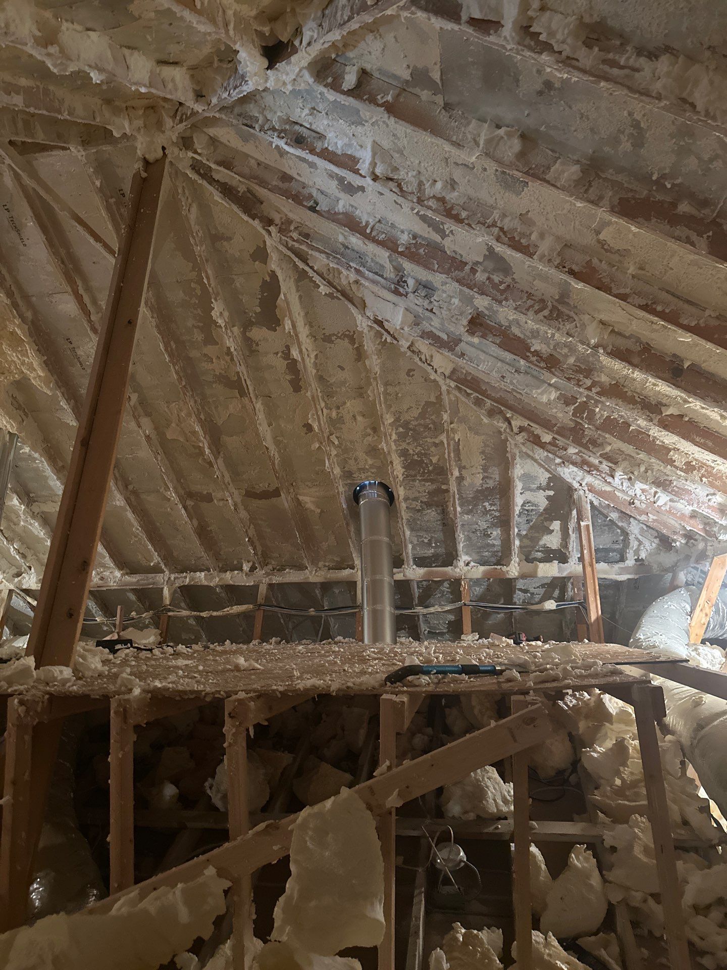 Spray foam insulation removal & re spray by Apex Insulation Solutions