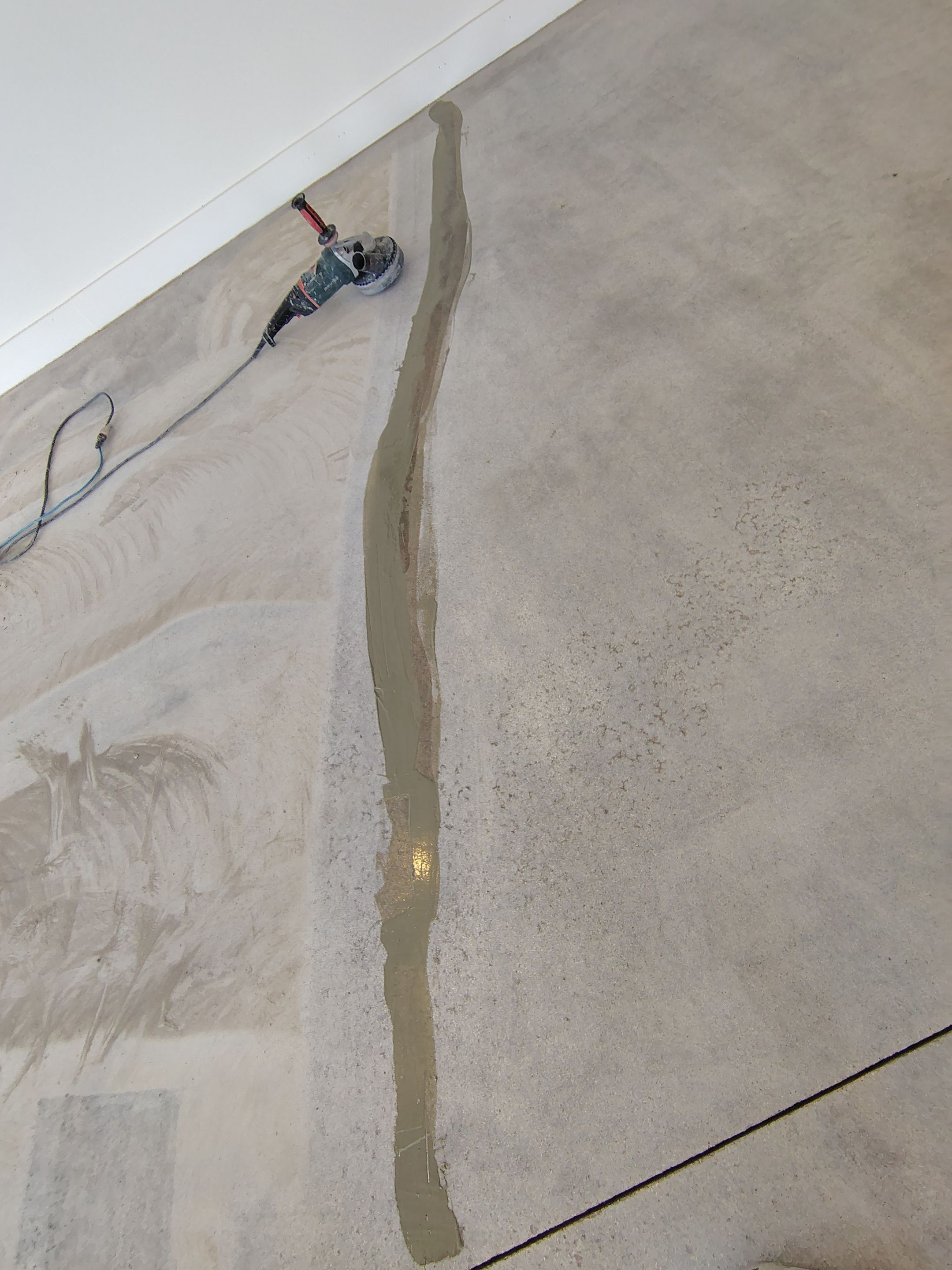 Feather Grey Floor Coating in Sioux Falls, SD by Select Painting, Coatings & Garage Cabinets