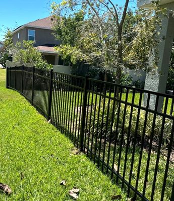 Aluminum Fence Installation using Black 3 Rail Aluminum and Vinyl Privacy Fence 