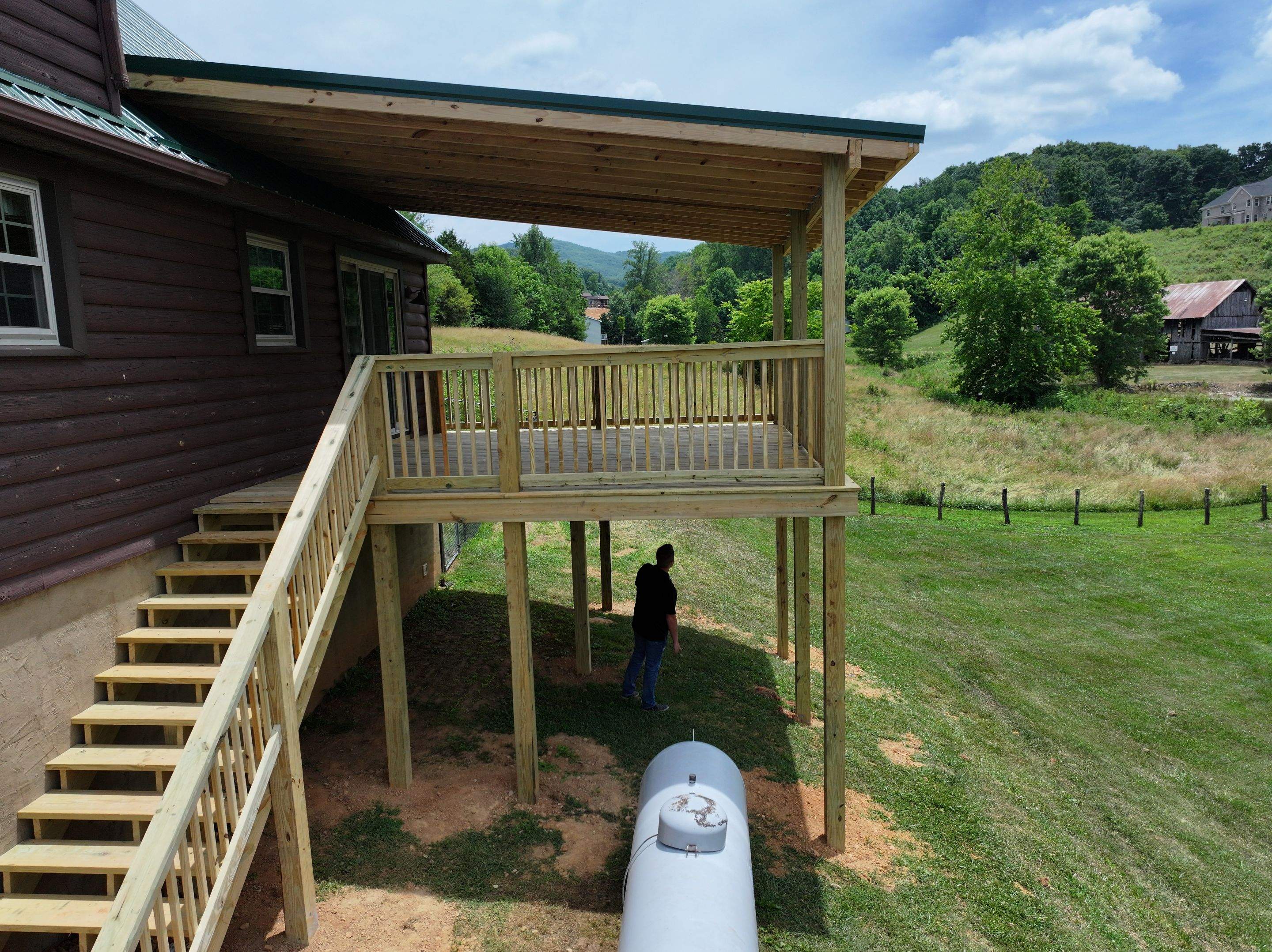 Paddle Creek Pet Ranch Cabin  by Omnia Roofing