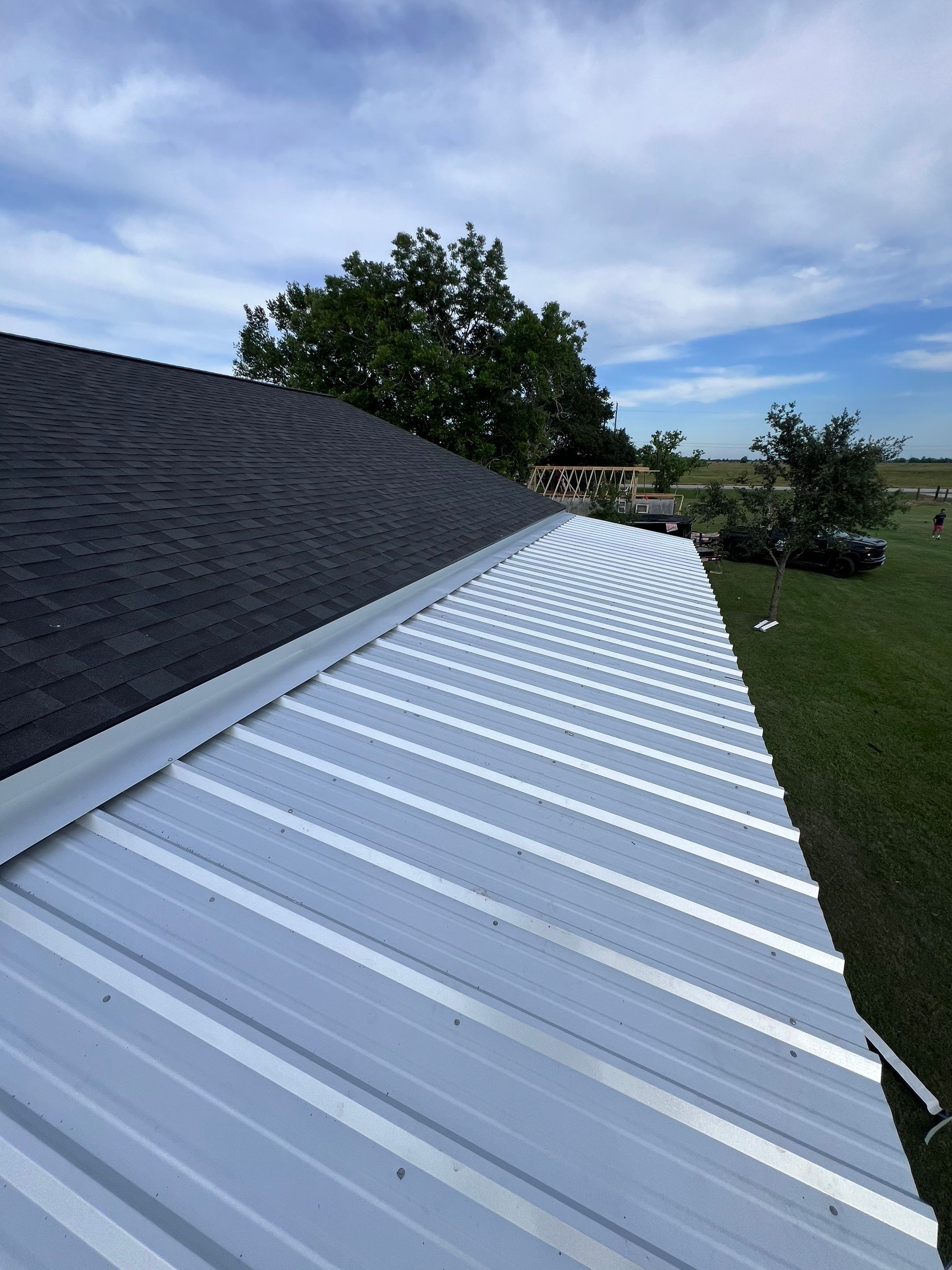Residential Roofing Installation using Metal by Roof Repair Company