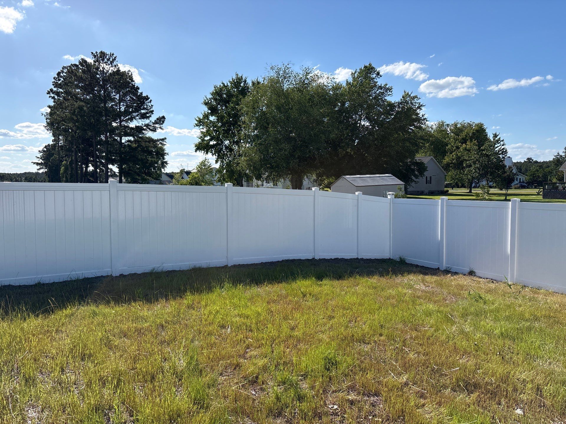 White Hamilton Vinyl Privacy Fence and Double Gate Installation in Greenville by Superior Fence and Rail