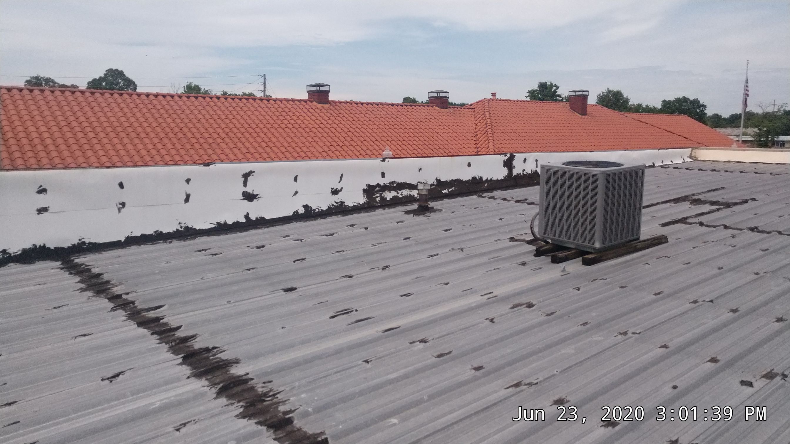 Commercial Metal Restoration System using Aldocoat Coatings by Hostetler Roofing