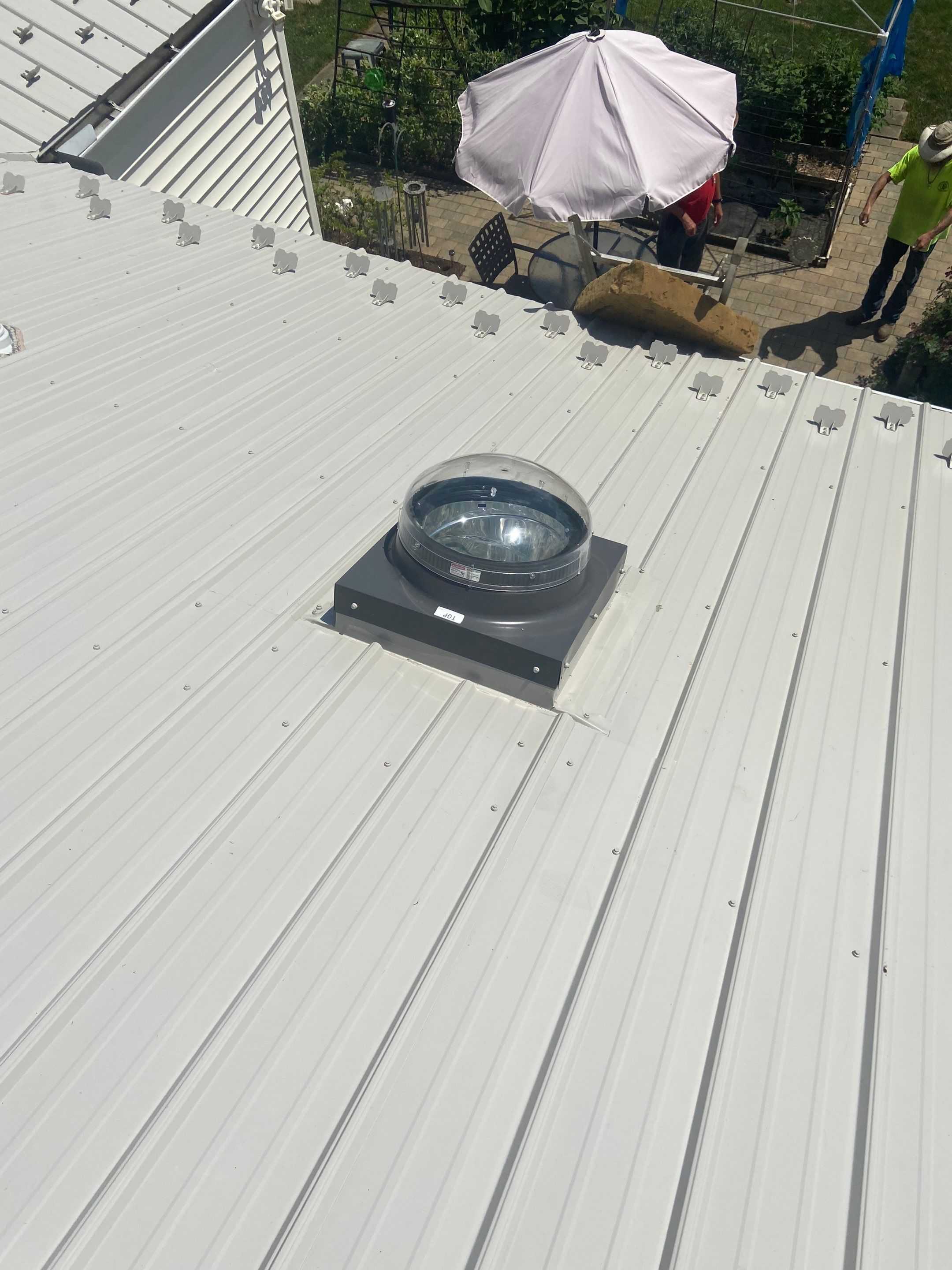 Metal Roofing, Skylights, Porch Build by Secure Construction Company Inc