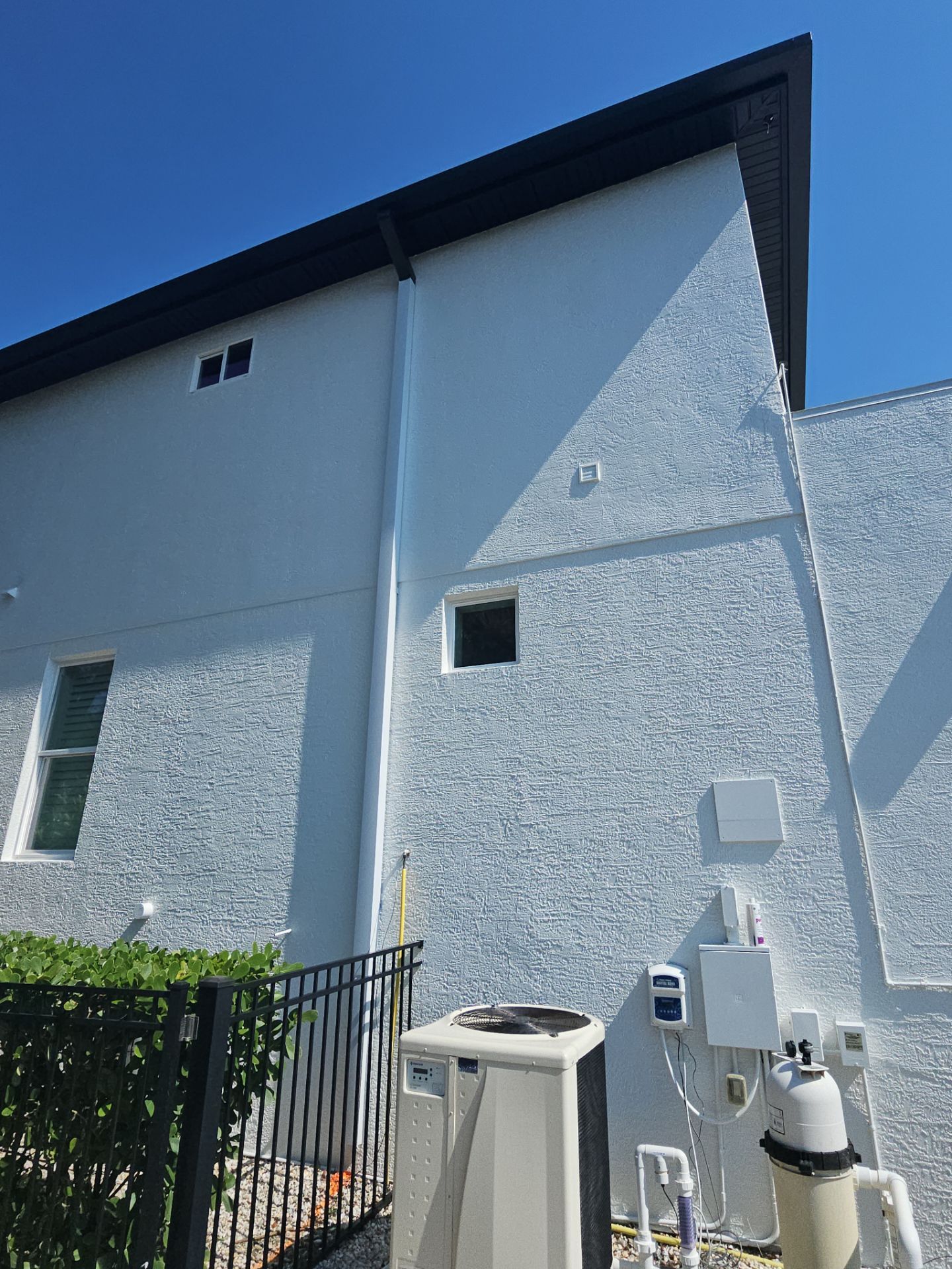 Soffit and Fascia Installation and black seamless gutters in Sarasota FL by Gutter Professors