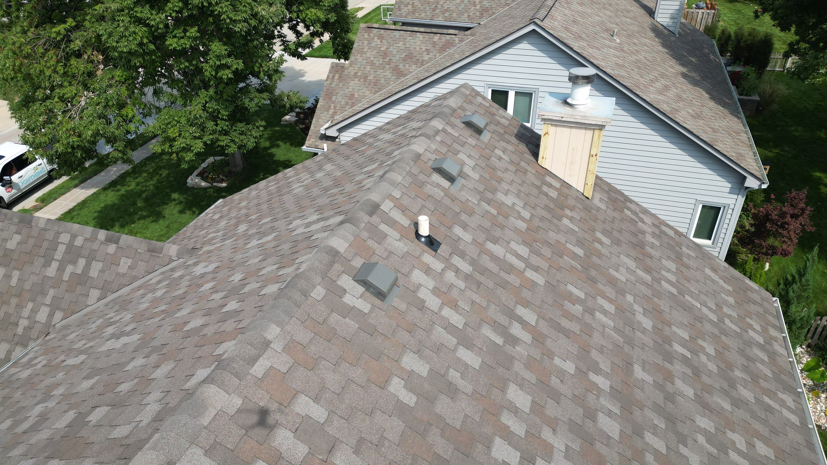 Residential Roofing Installation using IKO ArmourShake in Chalet Wood by Lightning Exteriors