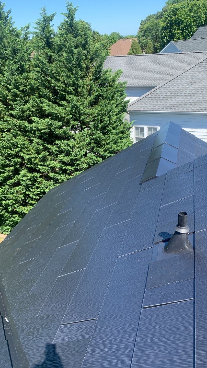 Tesla Solar Roof Replacement using Tesla Solar Roof V3 tiles by American Home Contractors