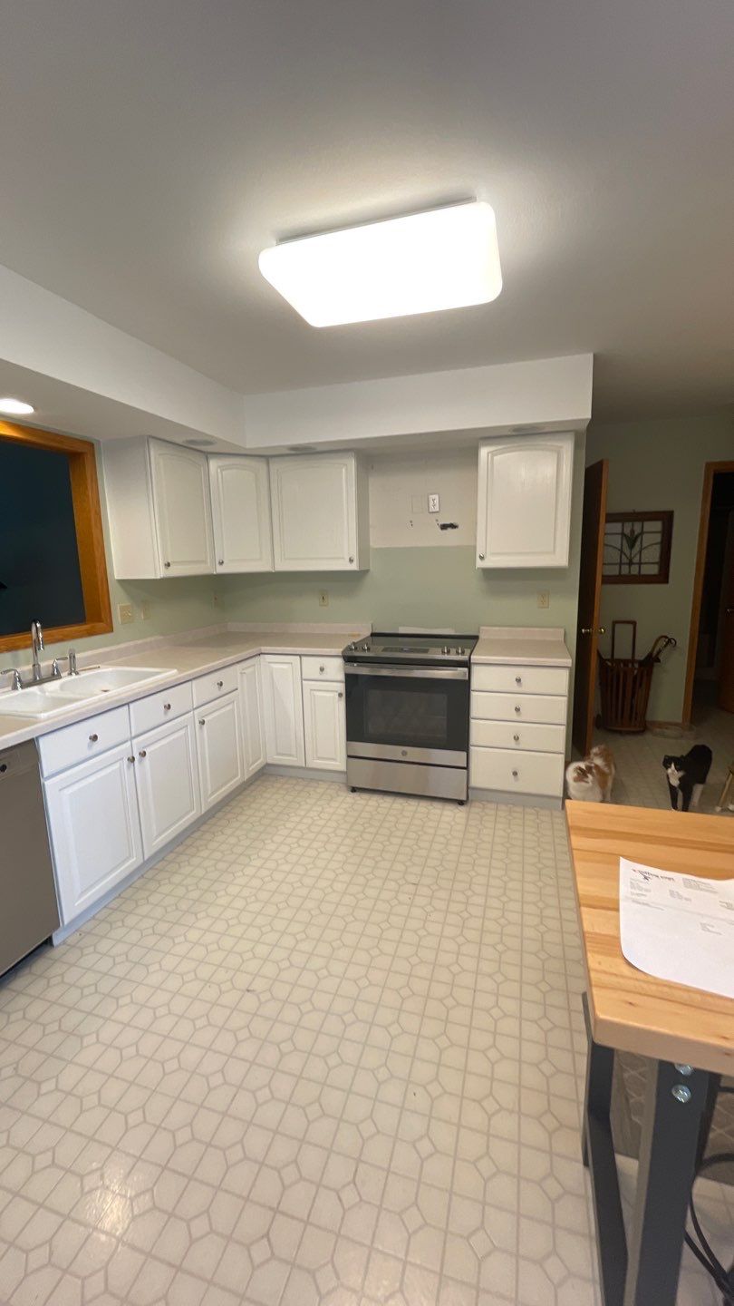 Cabinet Repaint by Cutting edge painting 