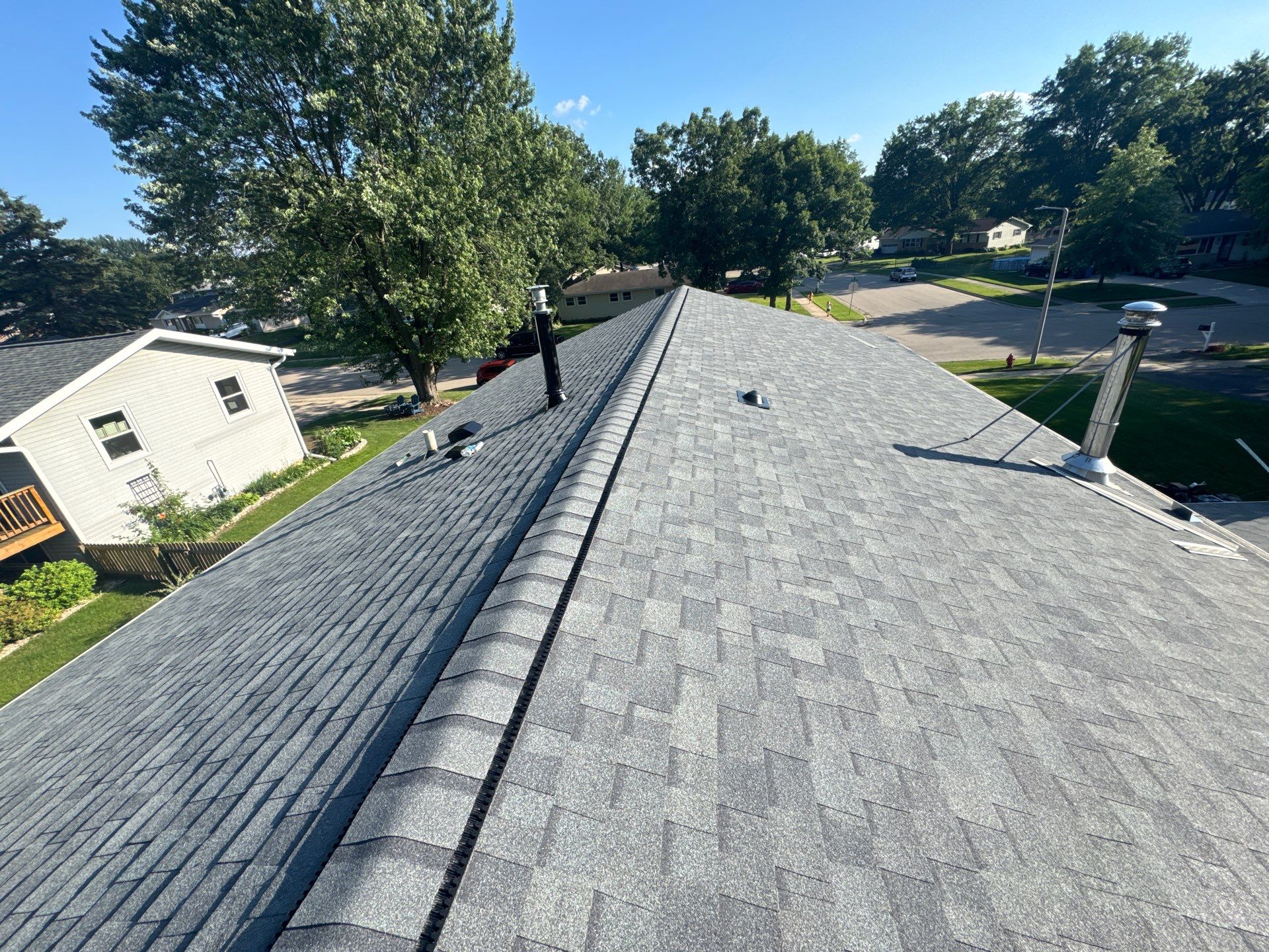 C.&E.: Roof by AFC Exteriors