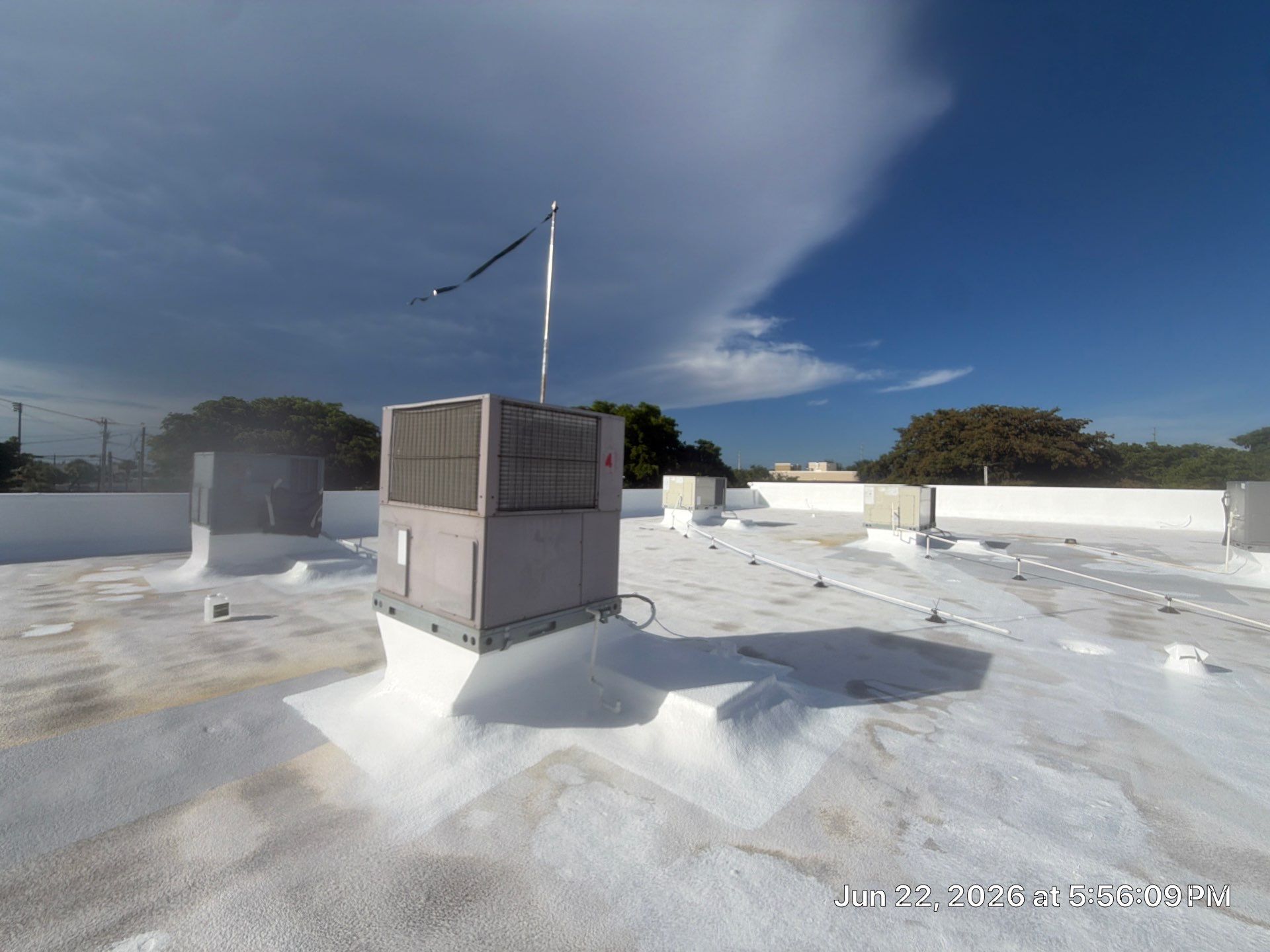 Commercial Flat Roof Restoration and Elastomeric Waterproofing in Delray Beach by Roof King LLC