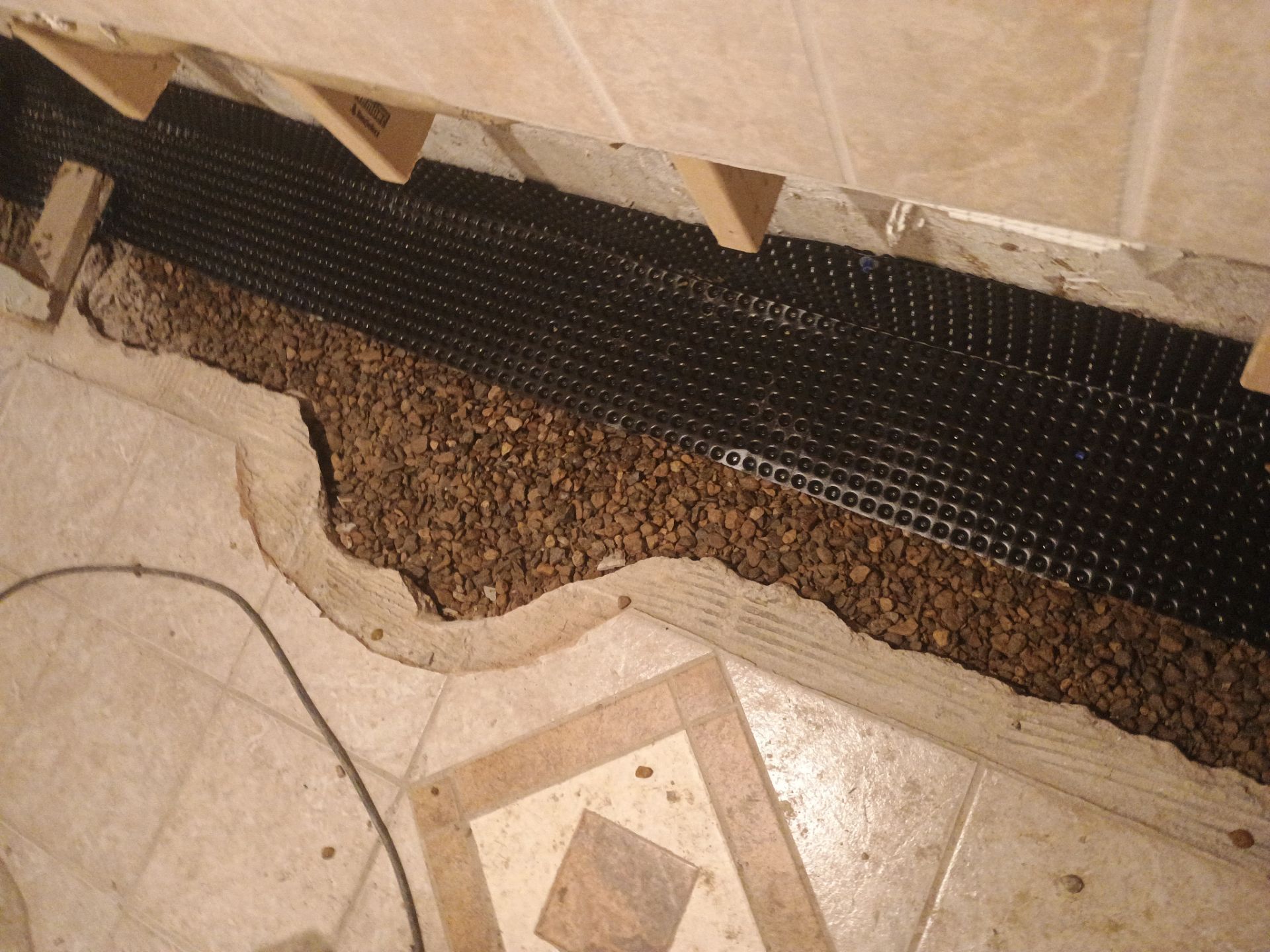 Drain Tile in Minneapolis for Kristen & Taylor by Waterproofing Northeast