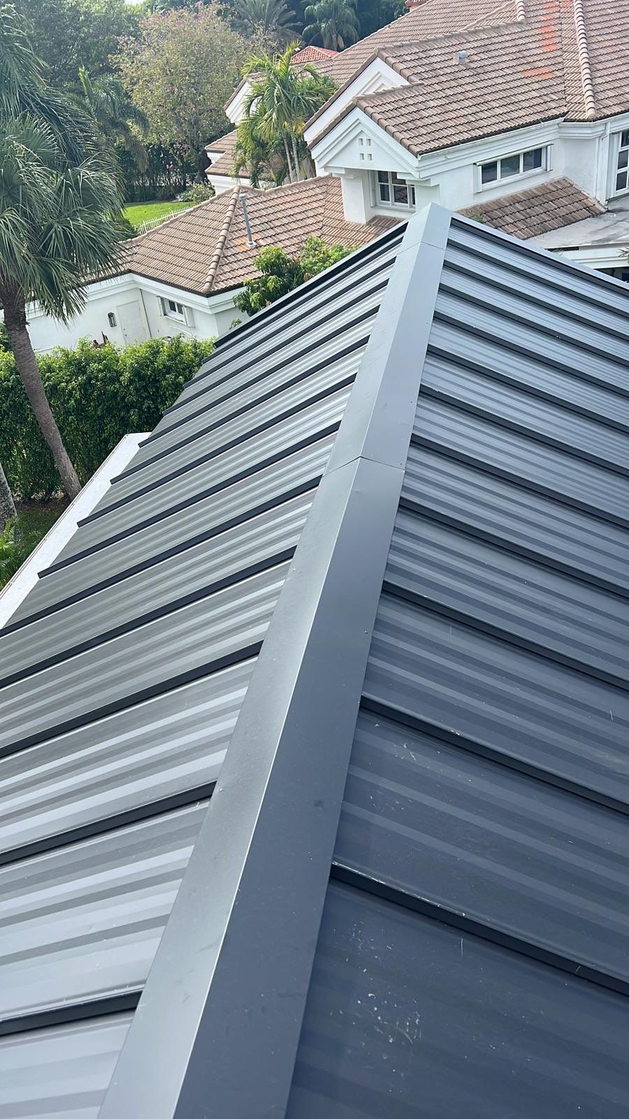 Residential Roofing Installation using 1" Nail strip metal roof by BLUES BROTHERS ROOFING
