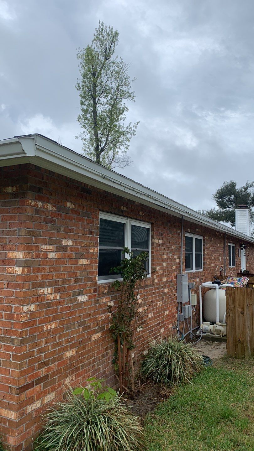 Seamless Aluminum Gutter and Down Spout Installation by Gutter Professors
