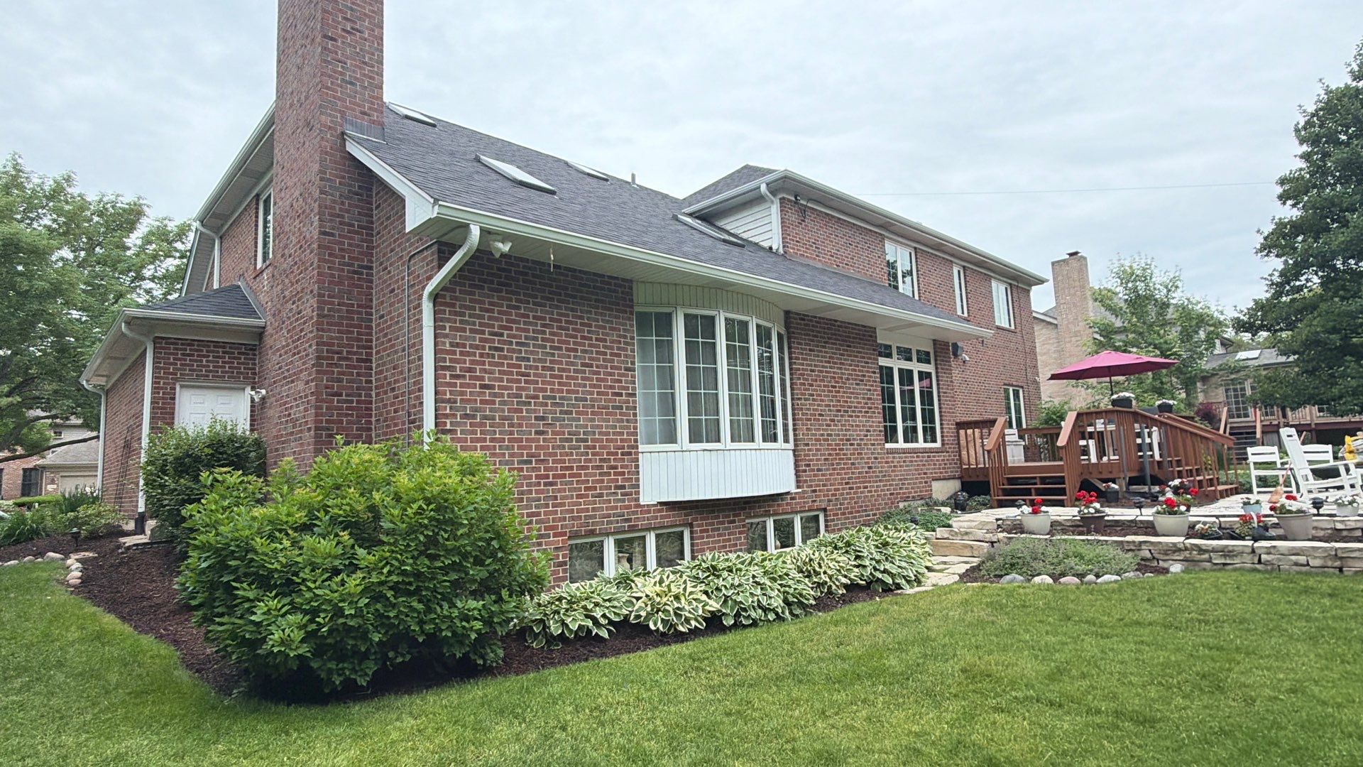 Asphalt Shingle Roof Replacement and Skylight Installation in Darien by Pro Home Services Inc