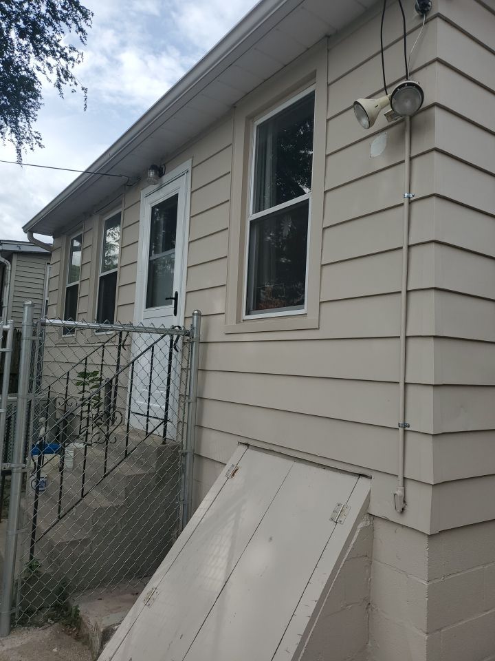 Window Installation using vinyl windows by Kraz Construction