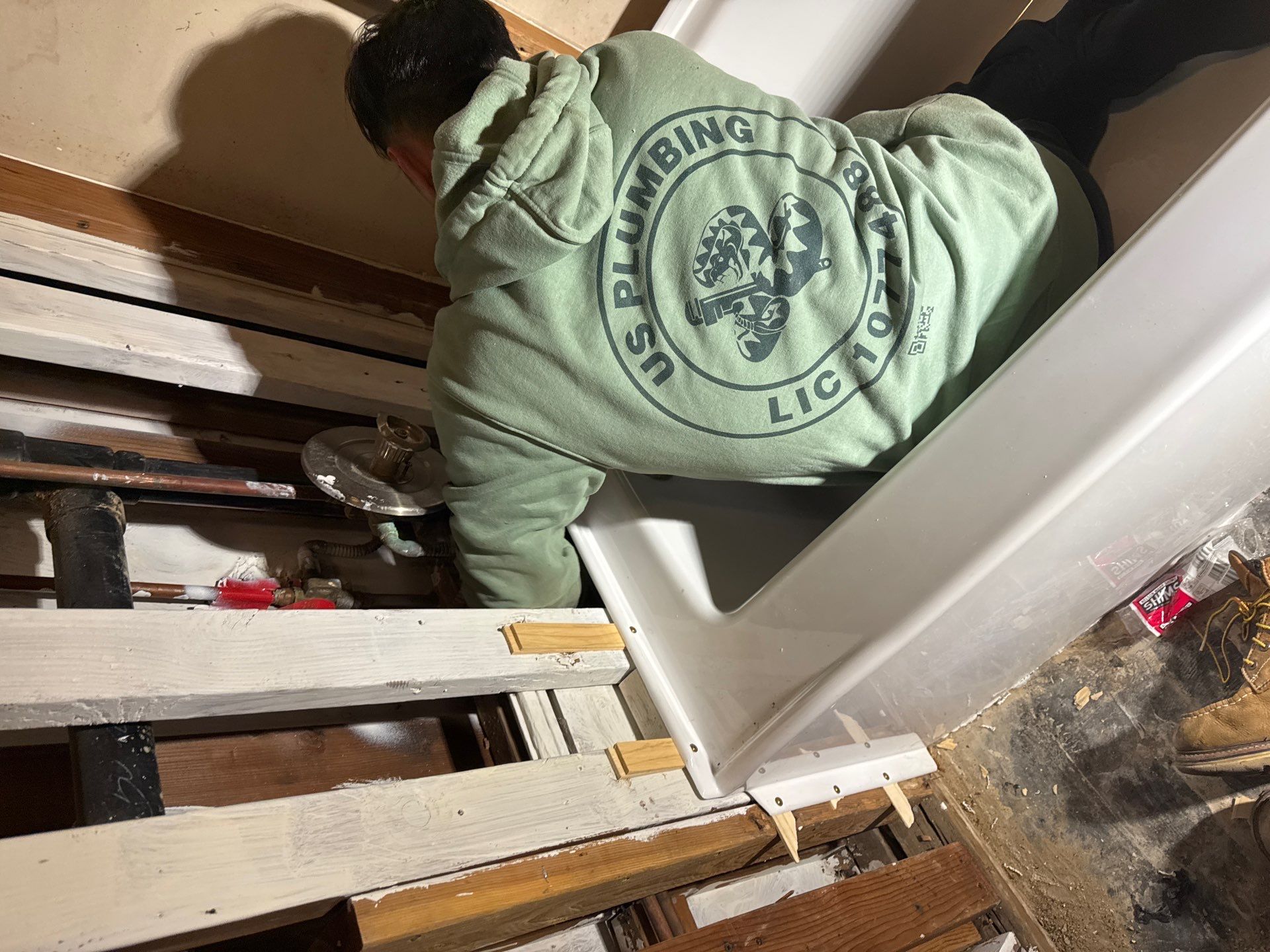 Shower Tub Installation with Underground Plumbing by Us Plumbing 