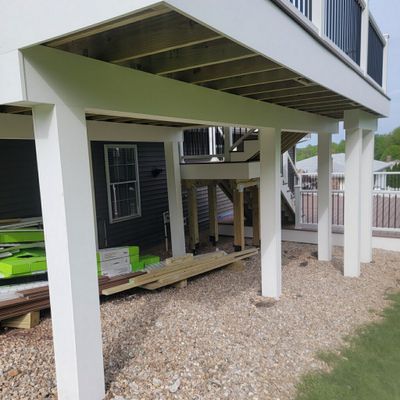 New Two Tier deck using Trex Hatteras boards and White Composite railings. 