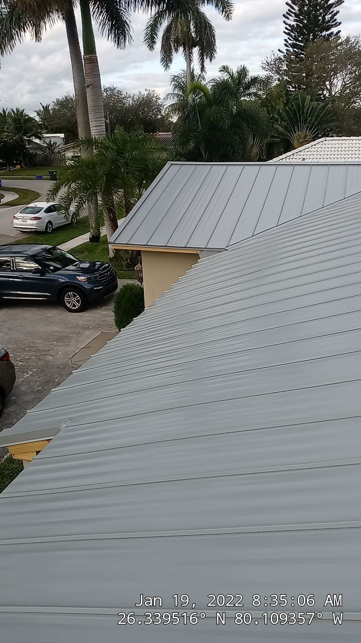 Residential Roofing Installation using 1" Nail strip metal roof by BLUES BROTHERS CONSTRUCTION CORP