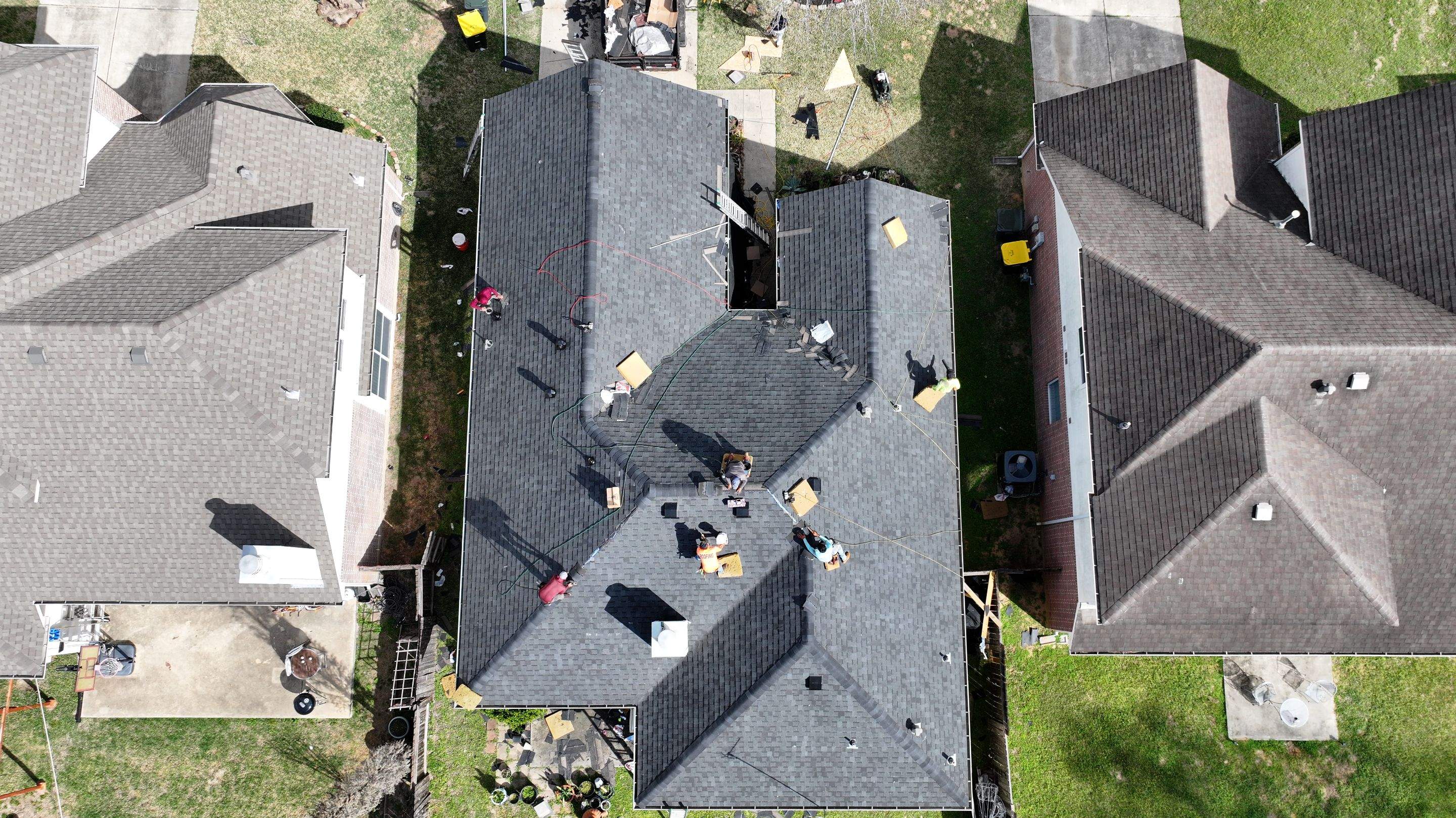 Full Roof Replacement on Brick Two-Story — Conroe, TX by PL Roofing & SB Roofing, LLC.